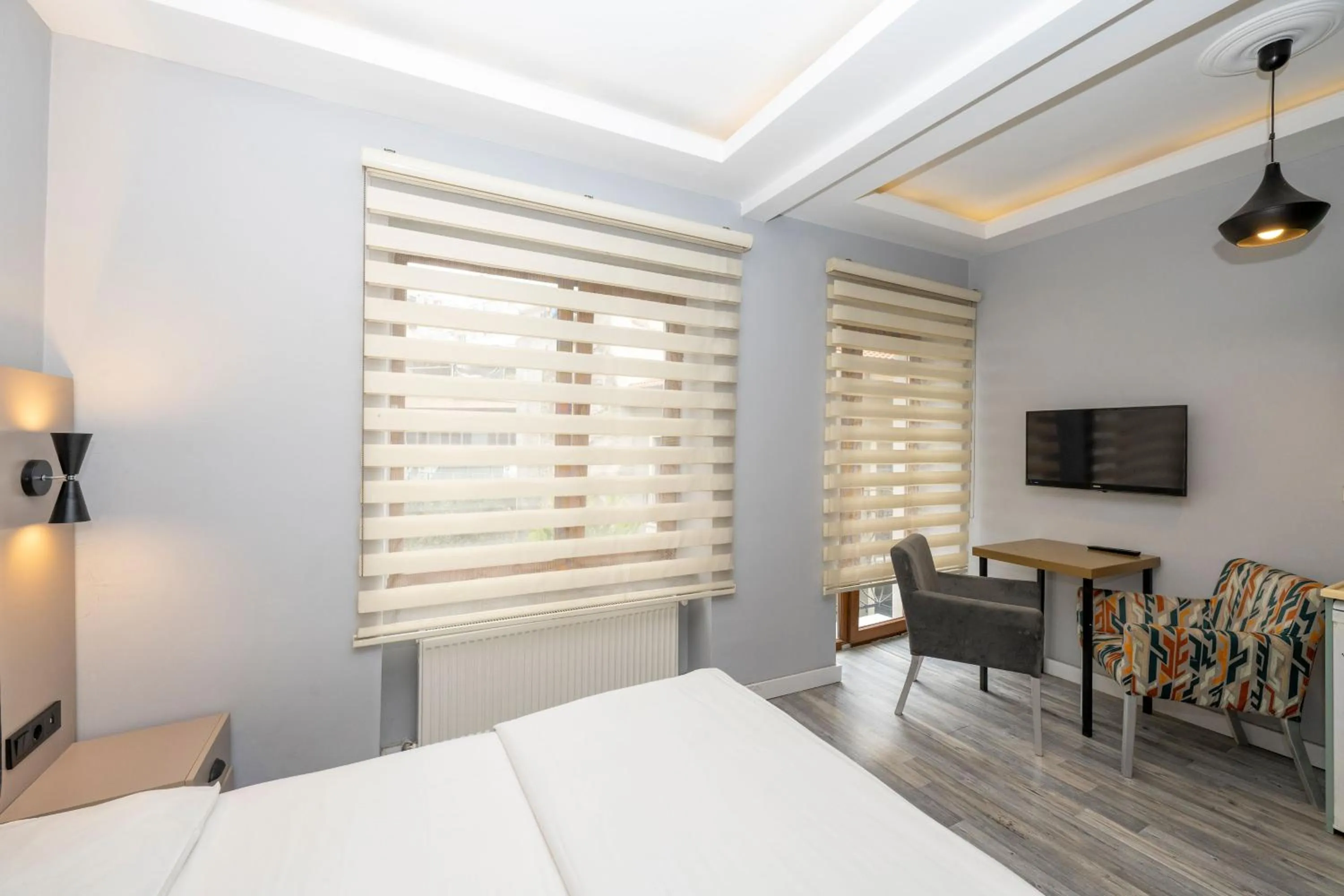 Bed in Cirrus Suites