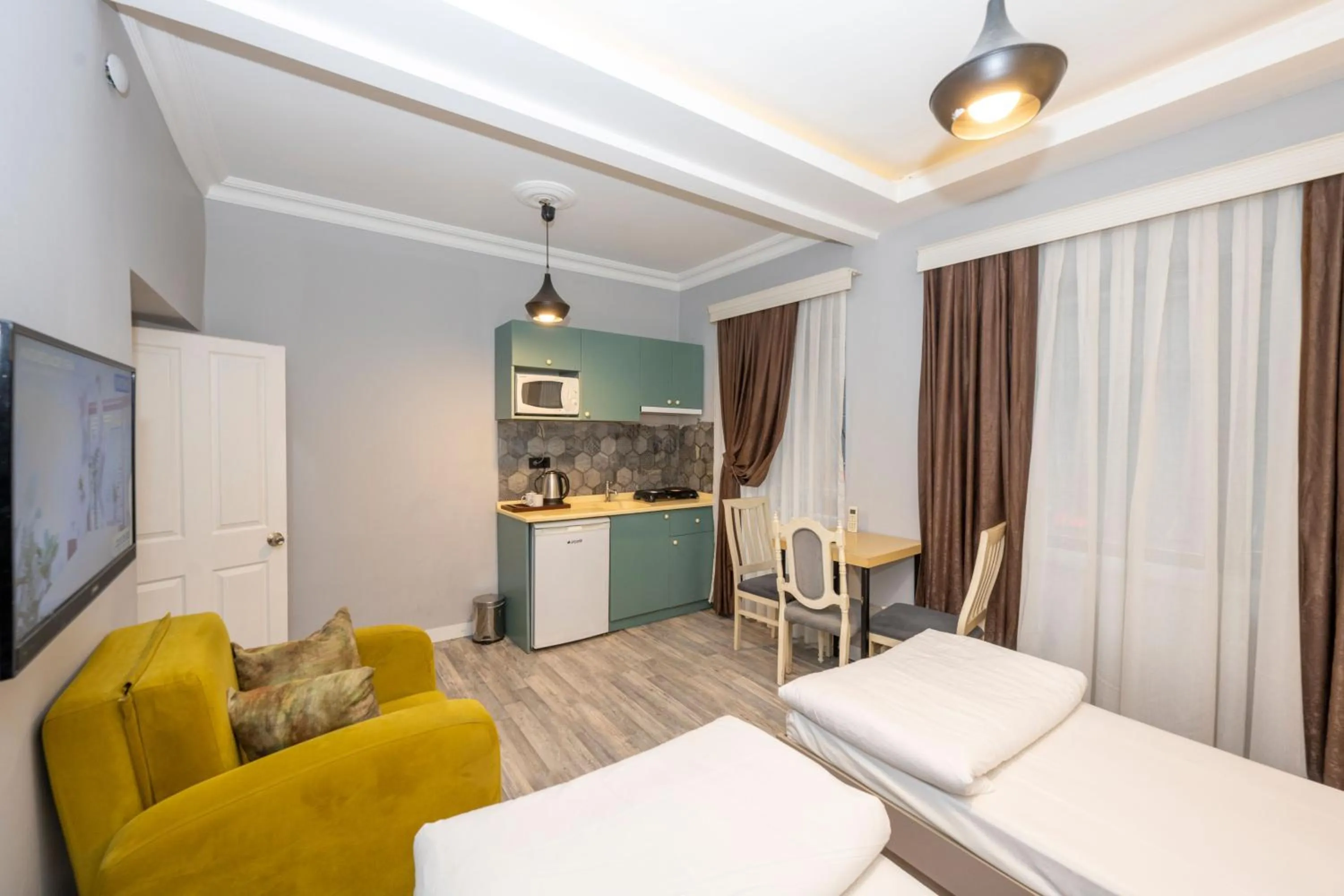 Bed in Cirrus Suites