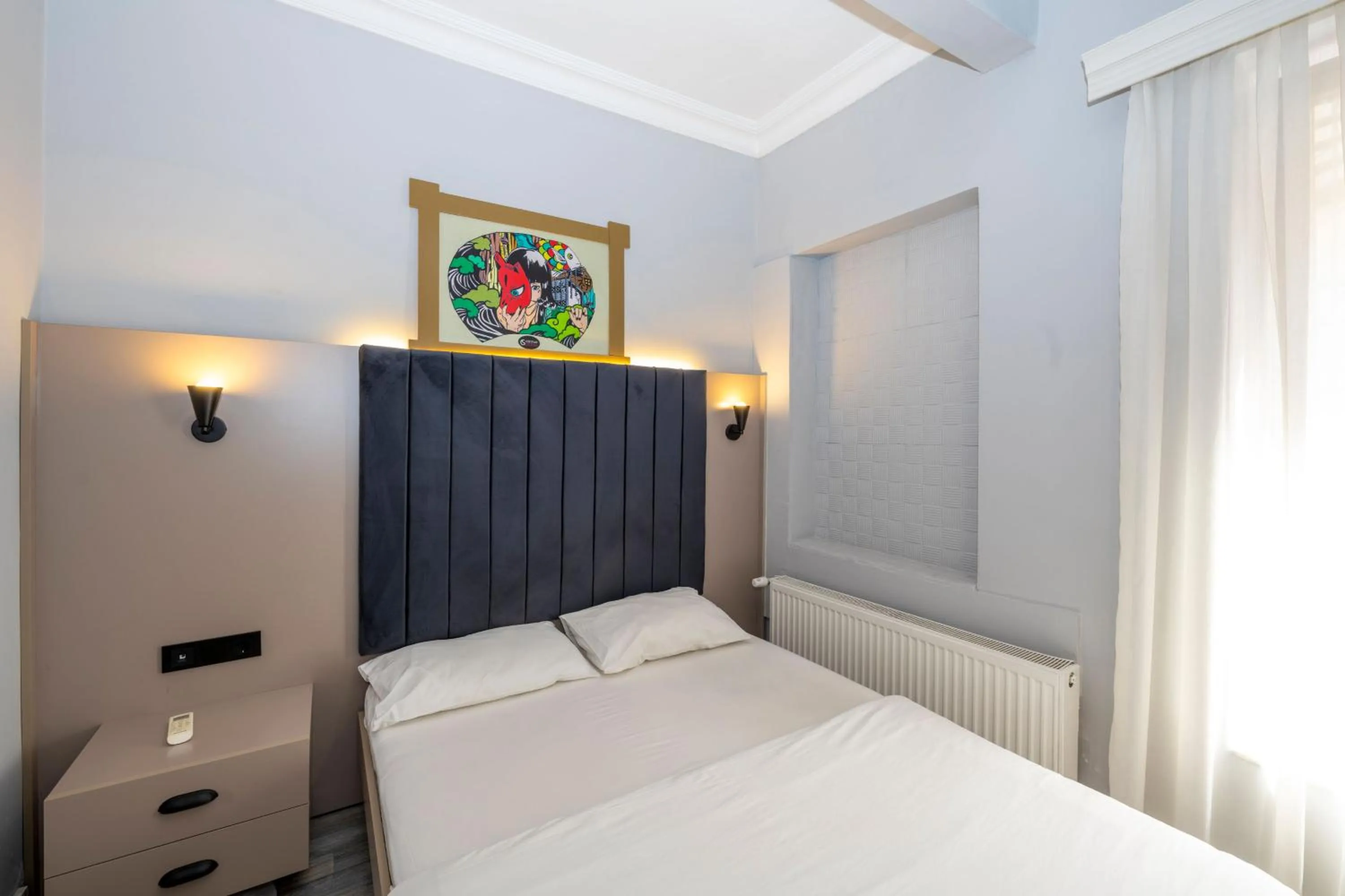 Bed in Cirrus Suites