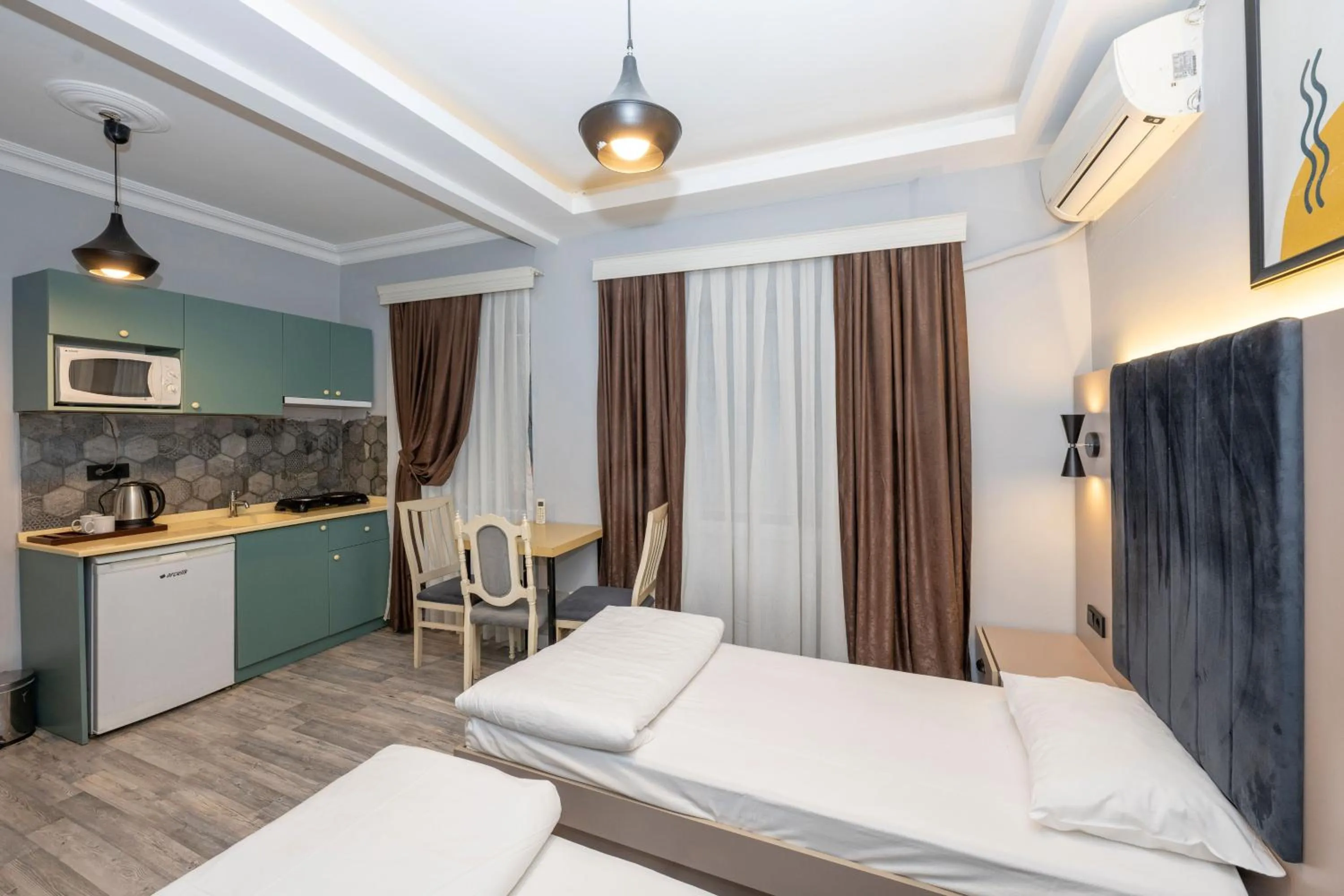 Bed in Cirrus Suites