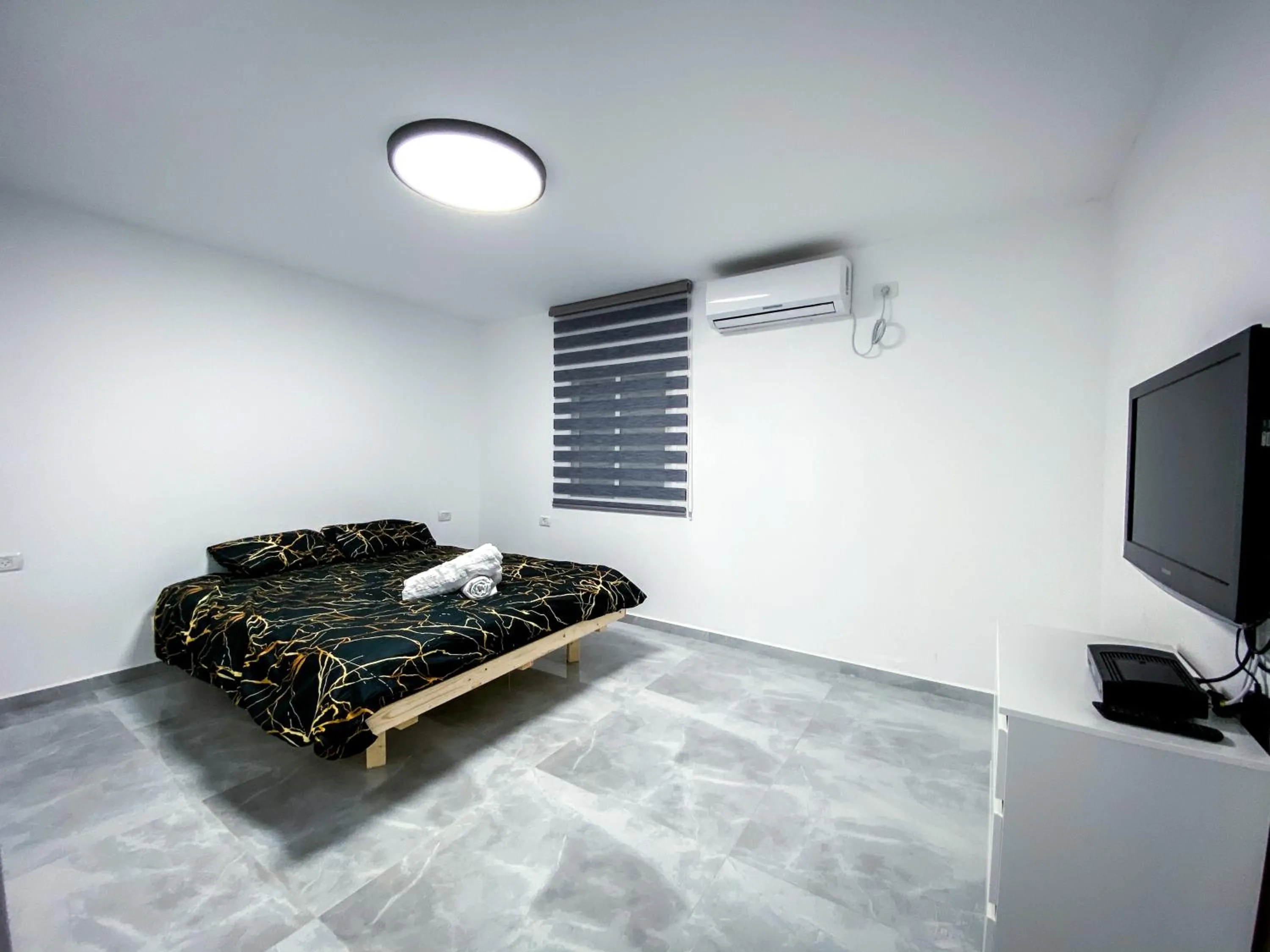 Bedroom in City Apartments