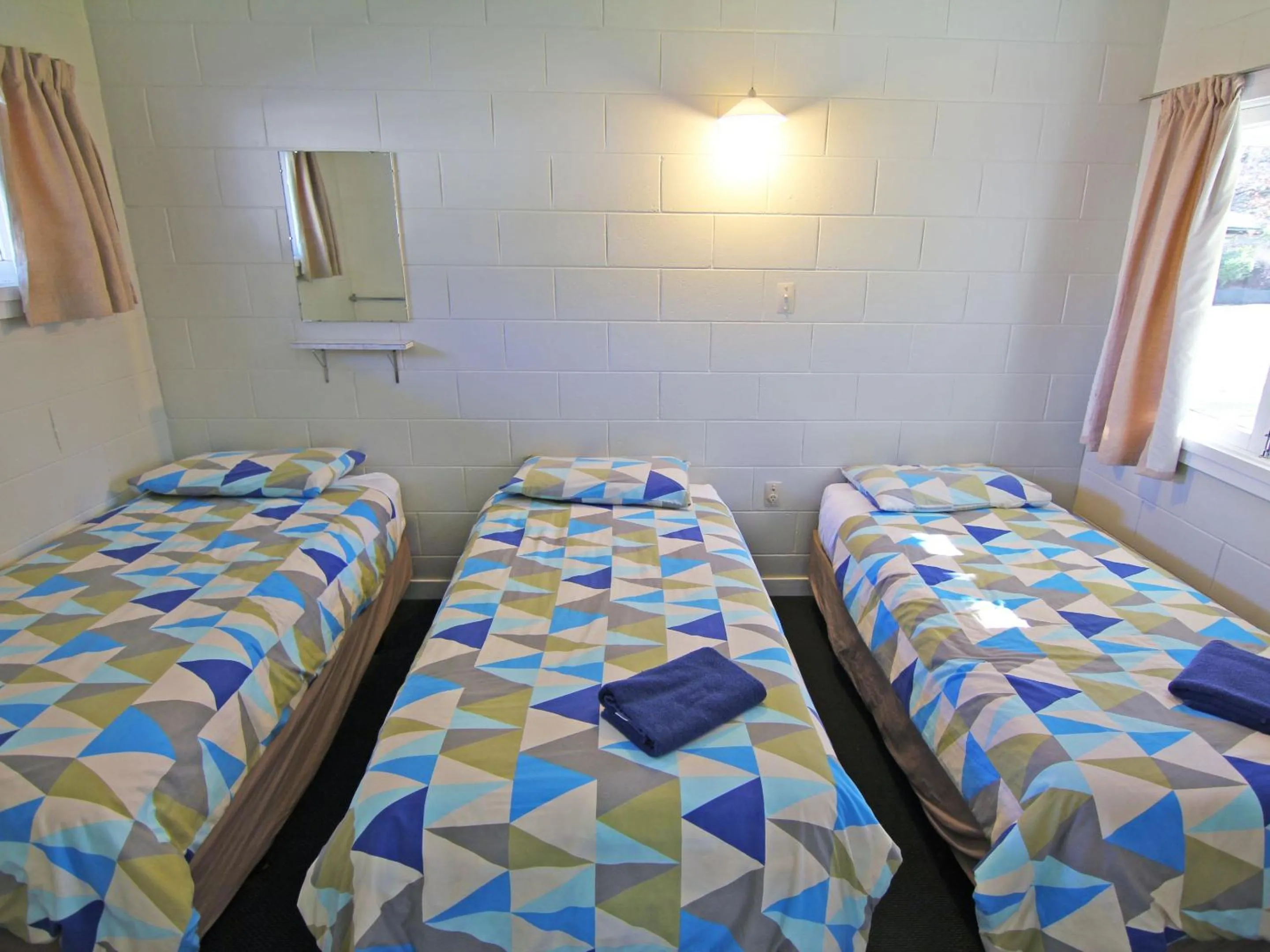 Bed in Alpine Adventure Holiday Park