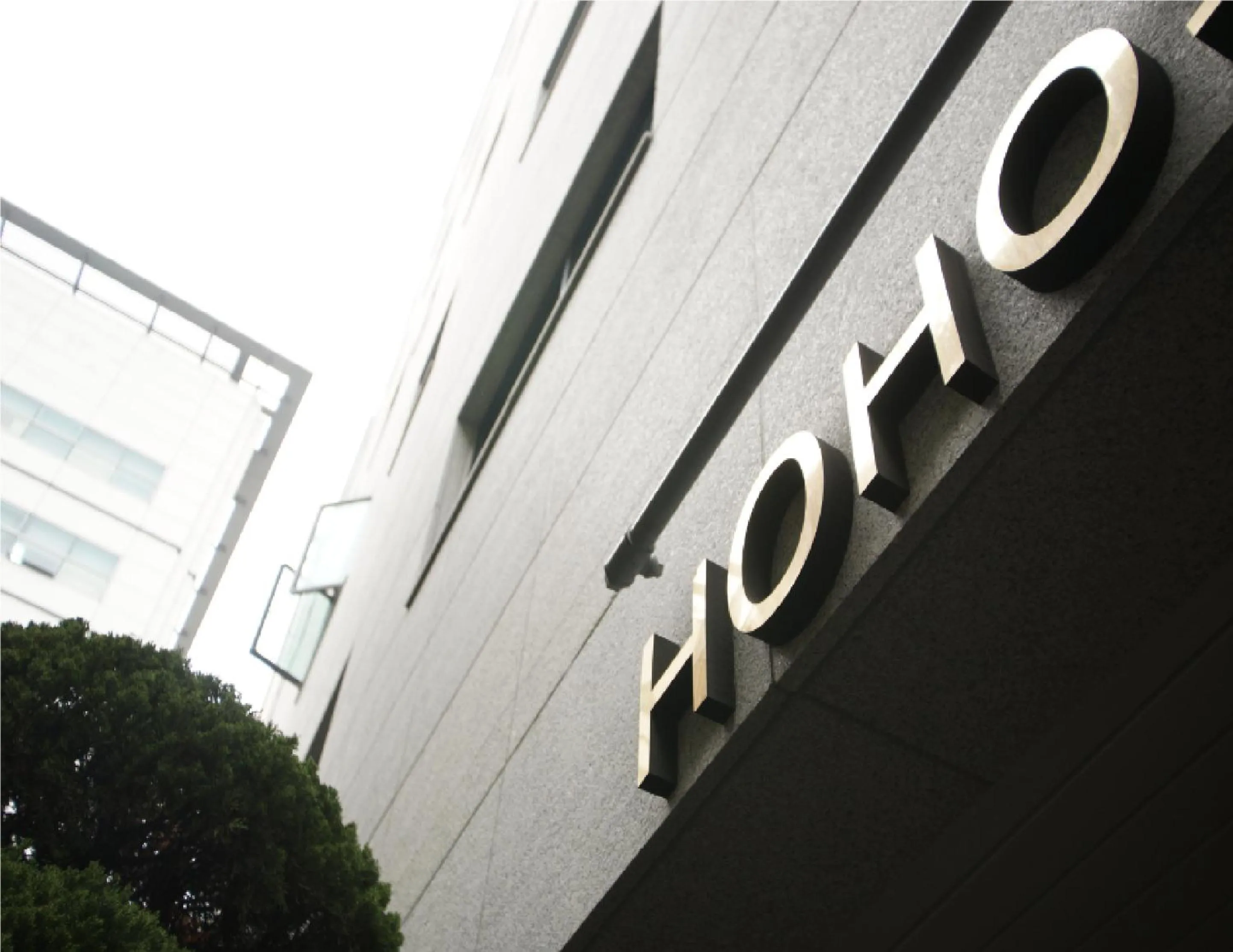 Property logo or sign in Ho Home Tel