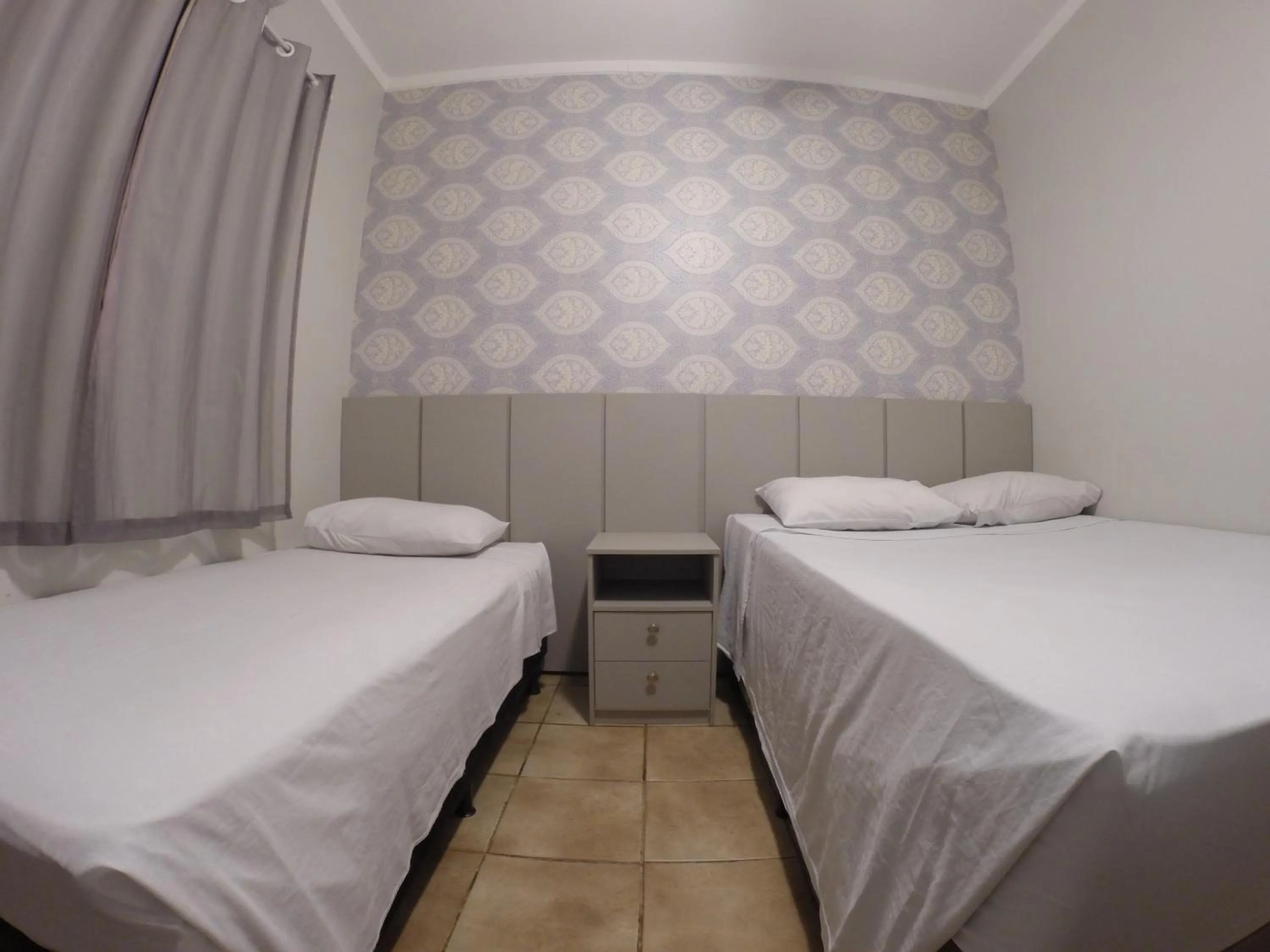 Bed in POUSADA EVELINA