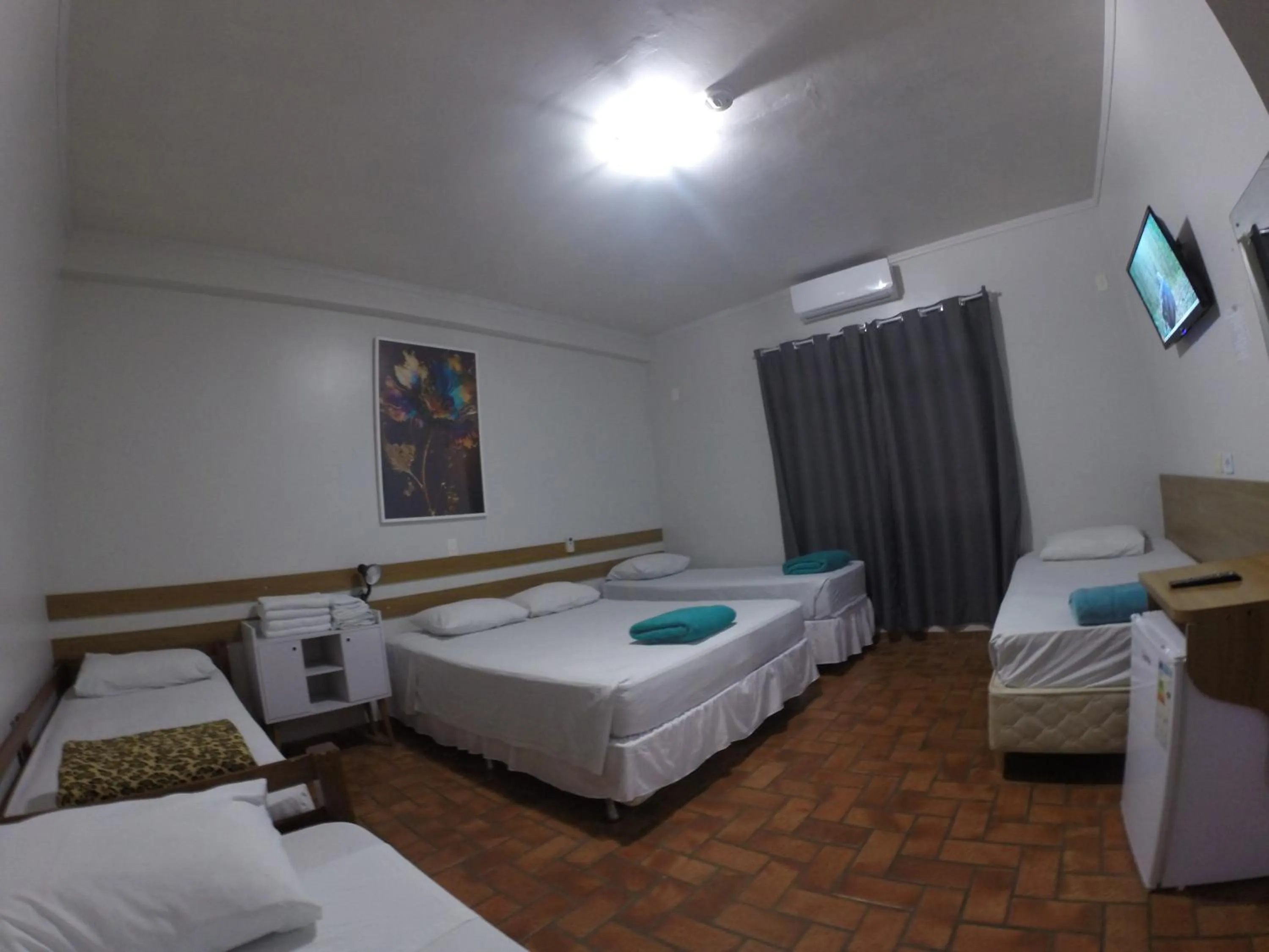 Bed in POUSADA EVELINA