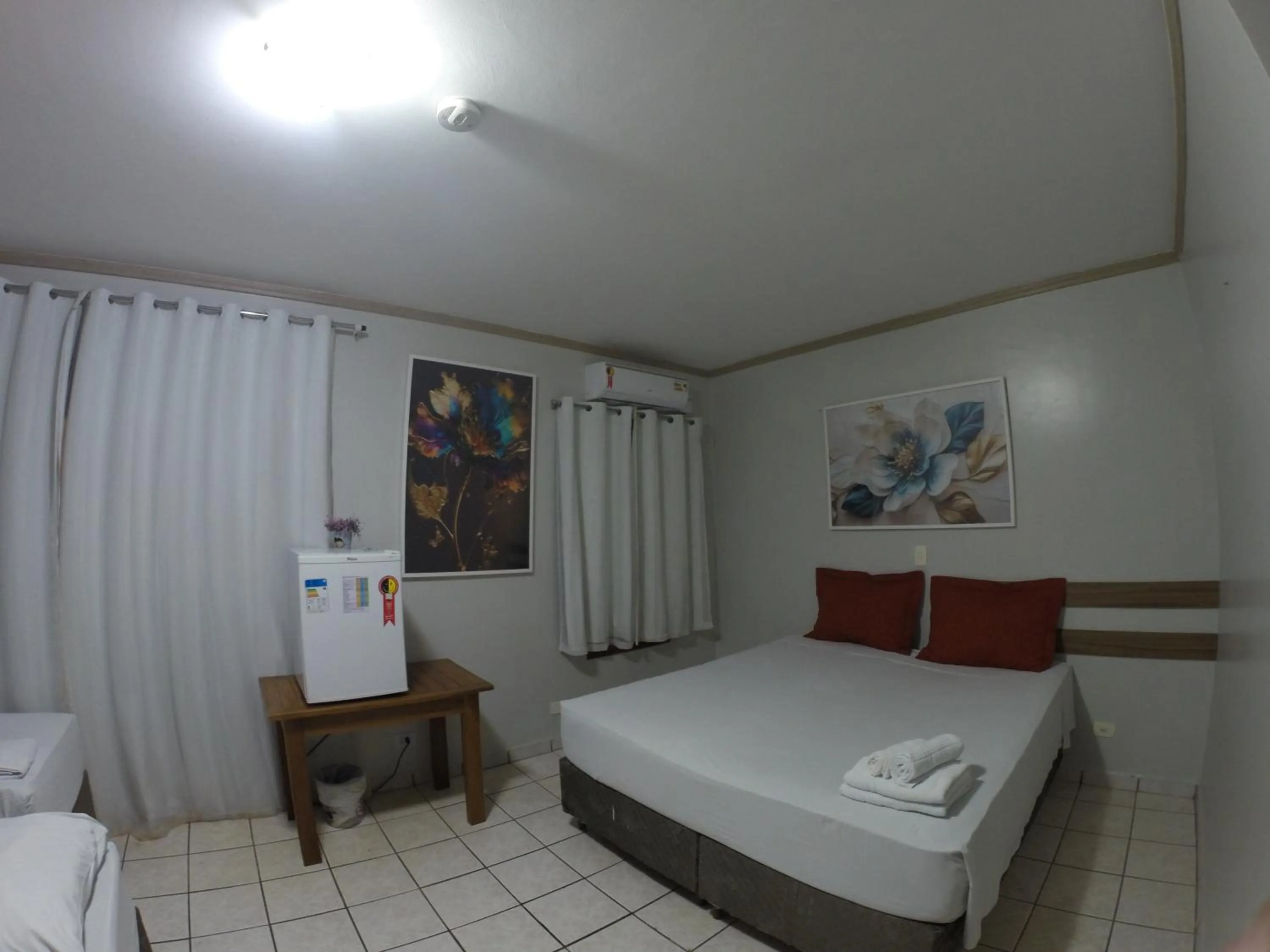 Bed in POUSADA EVELINA