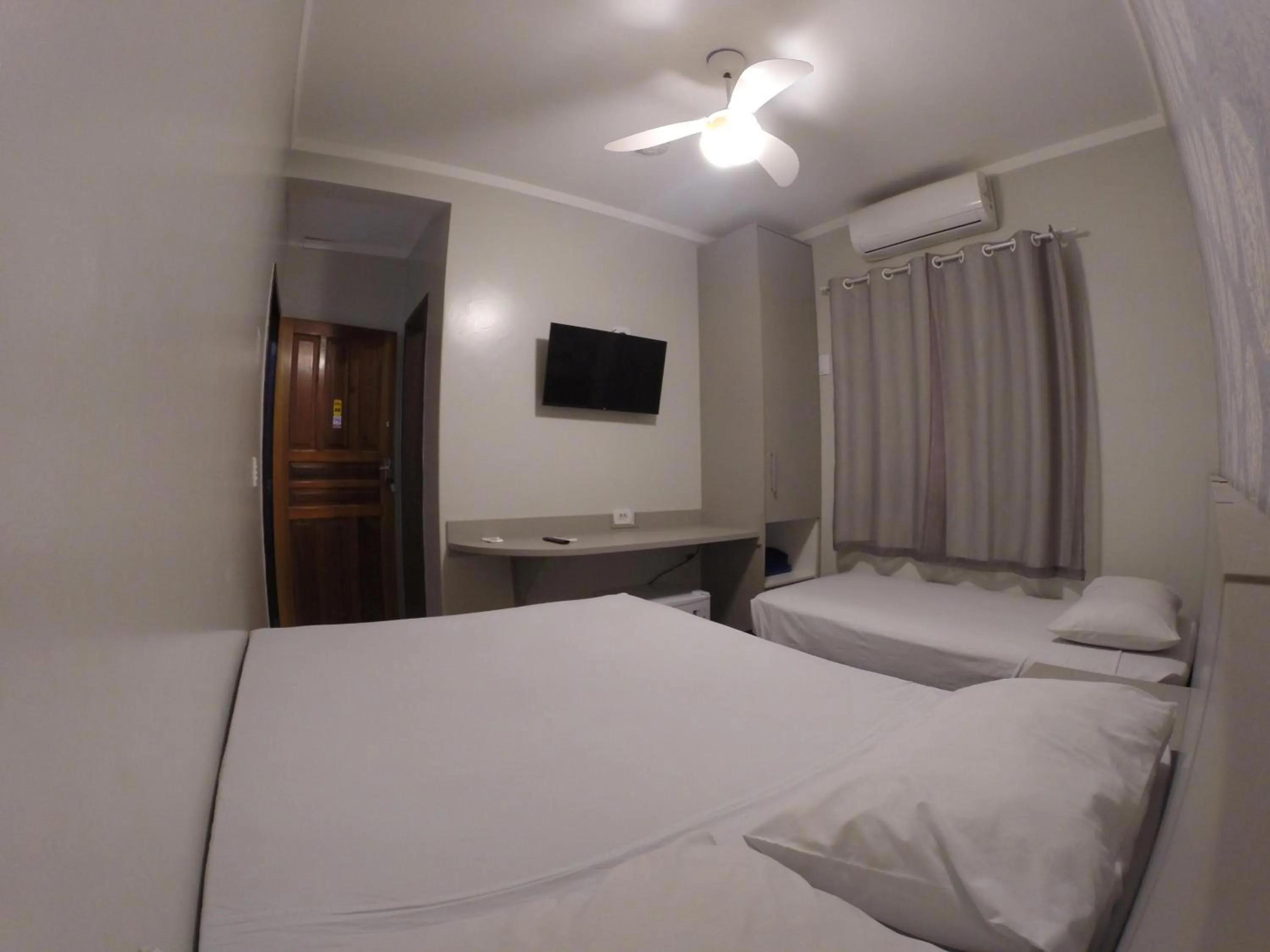 Bed in POUSADA EVELINA