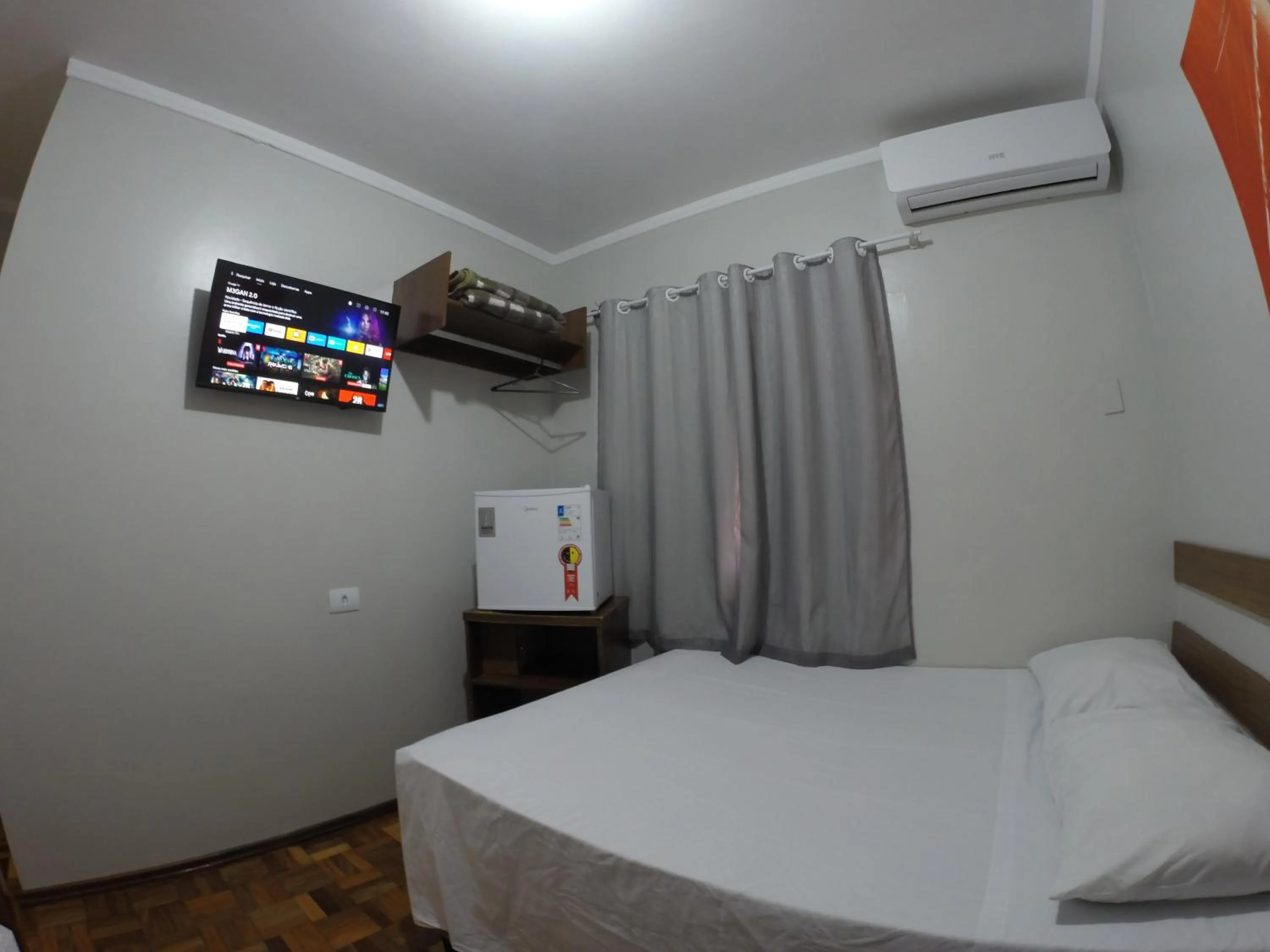 Bed in POUSADA EVELINA