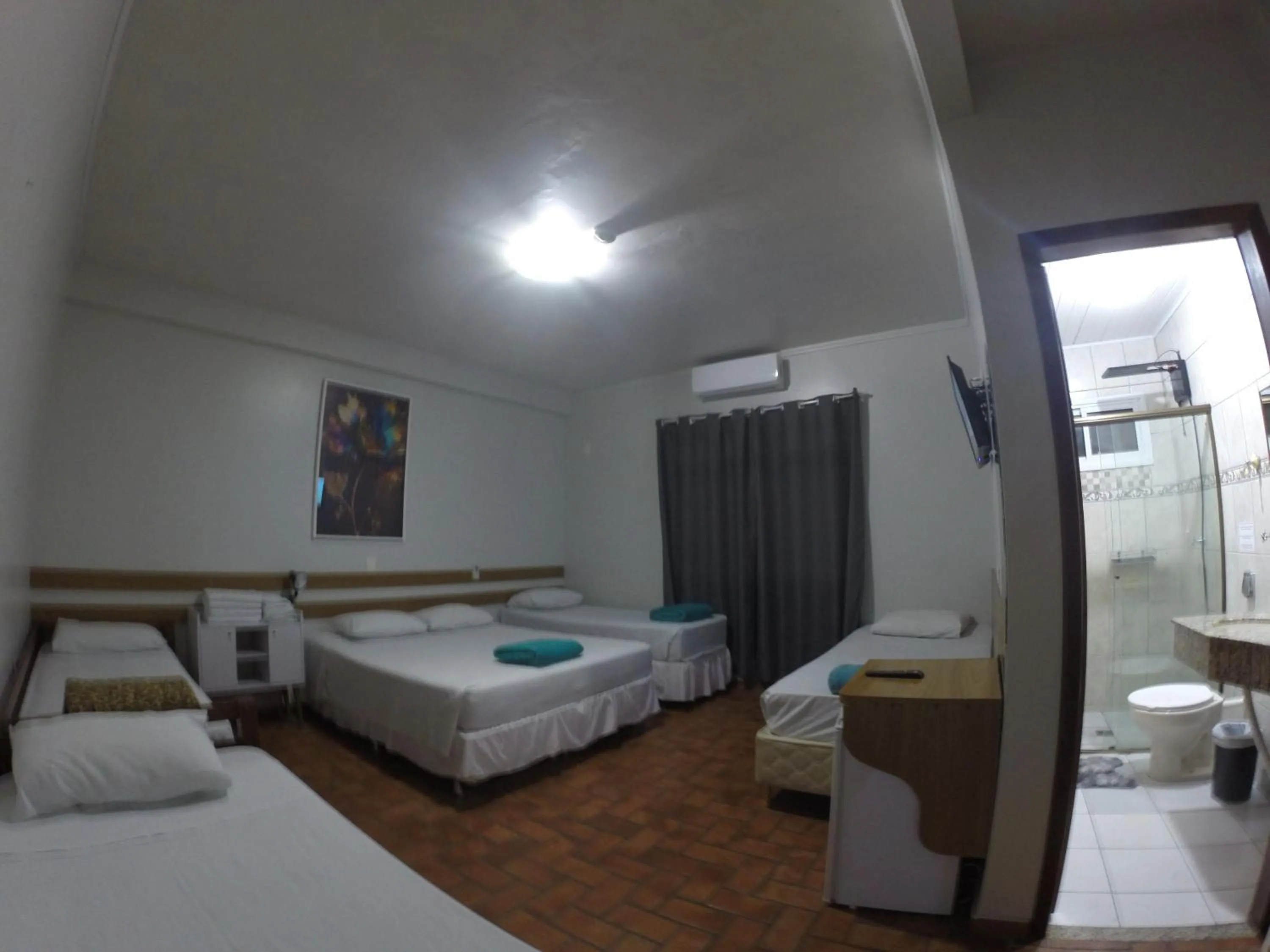 Bed in POUSADA EVELINA