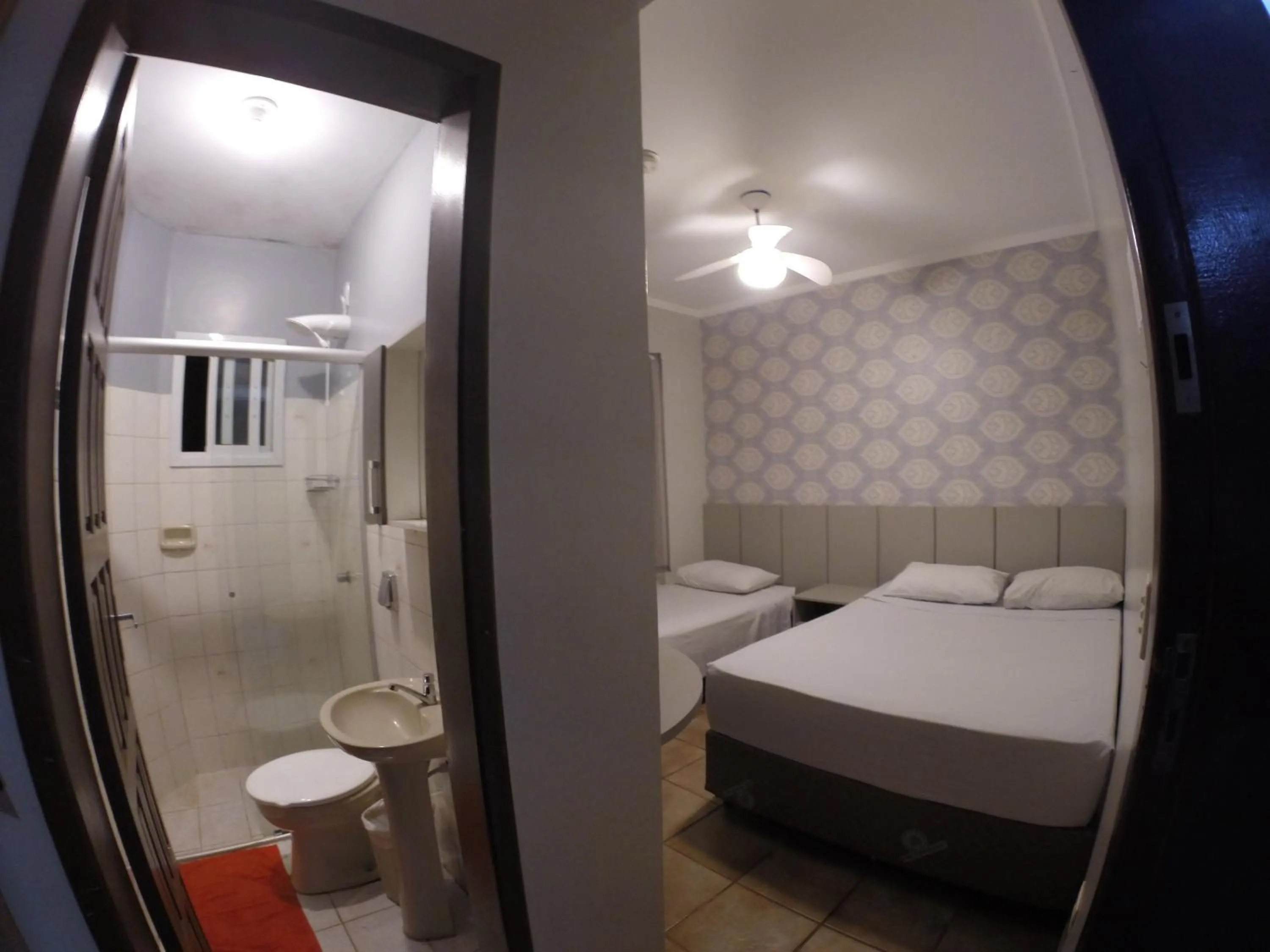 Bed in POUSADA EVELINA