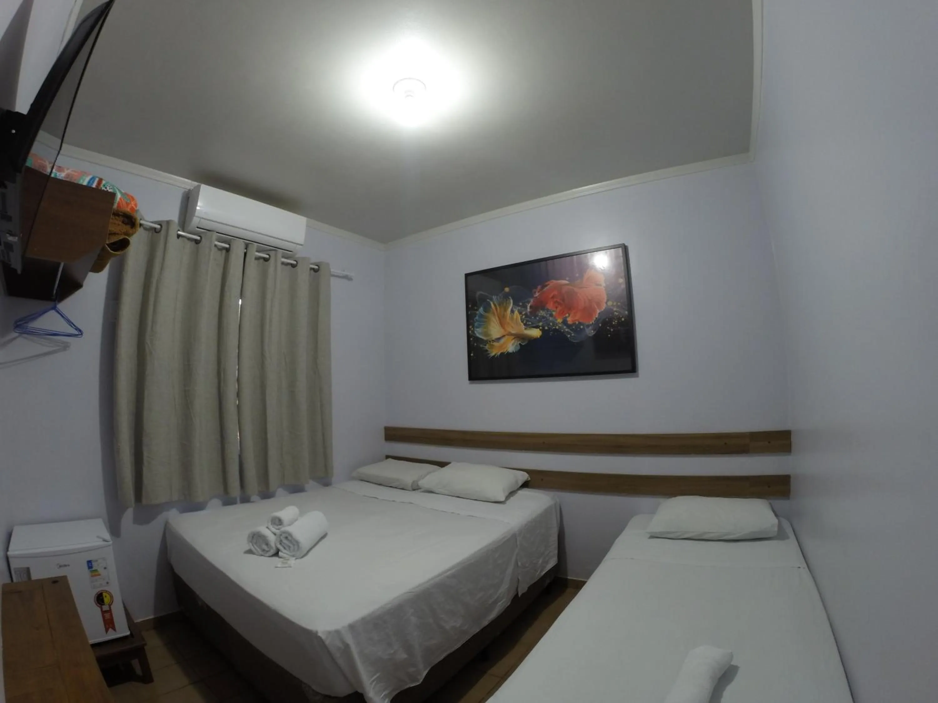 Bed in POUSADA EVELINA