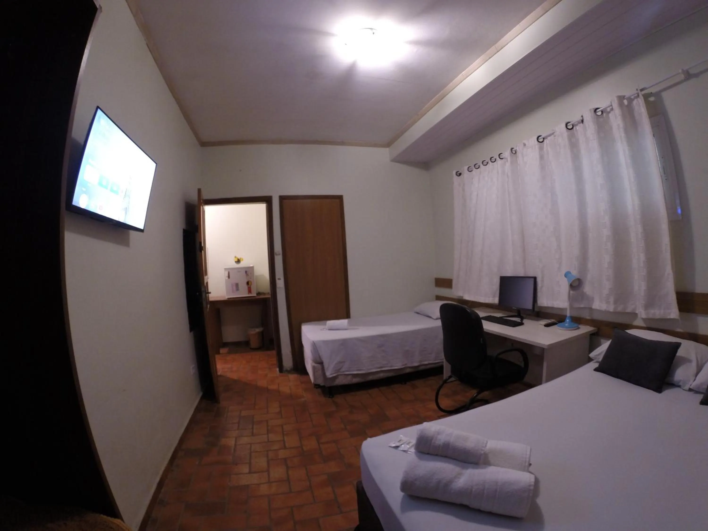 Bed in POUSADA EVELINA