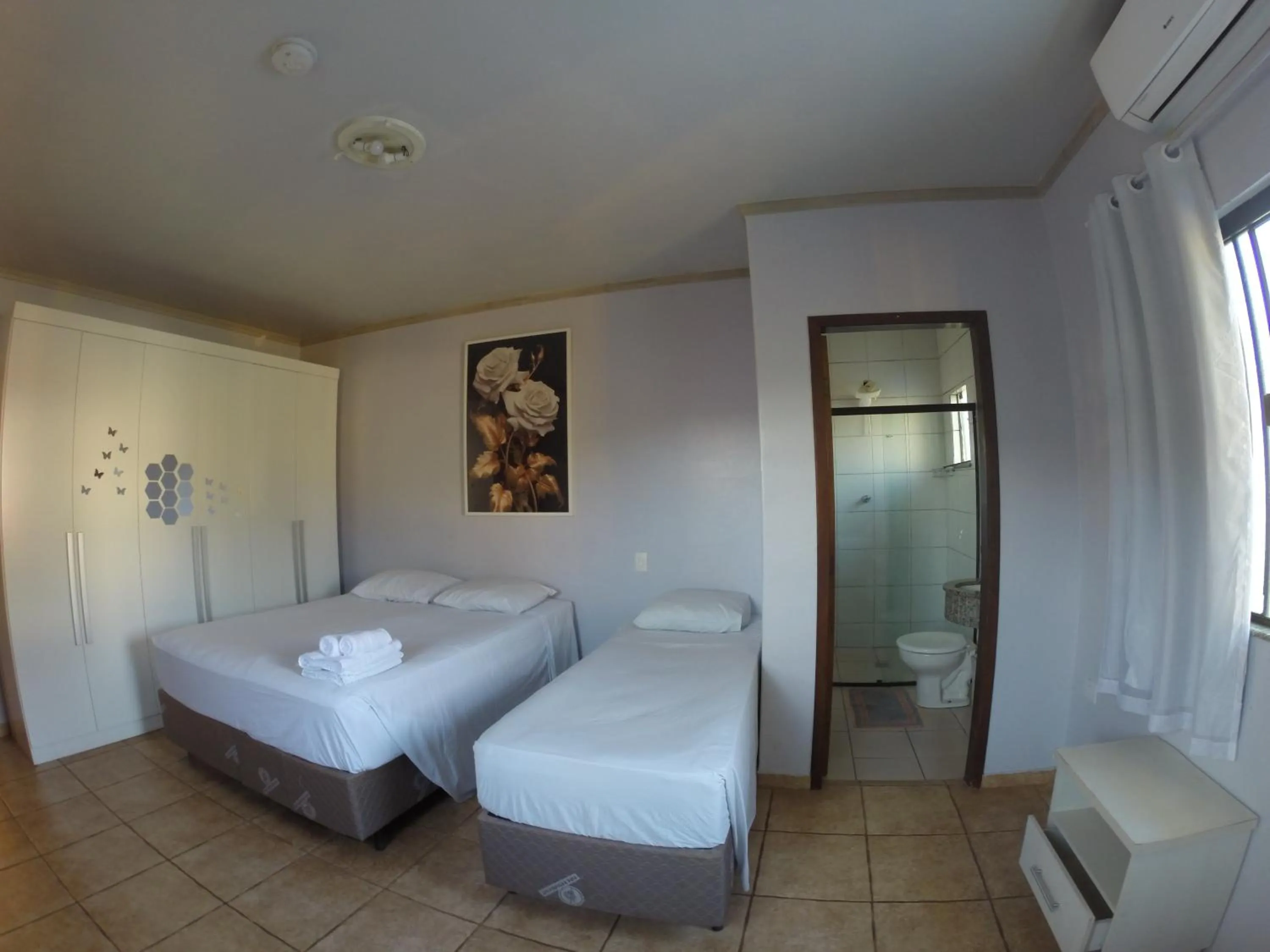 Bed in POUSADA EVELINA