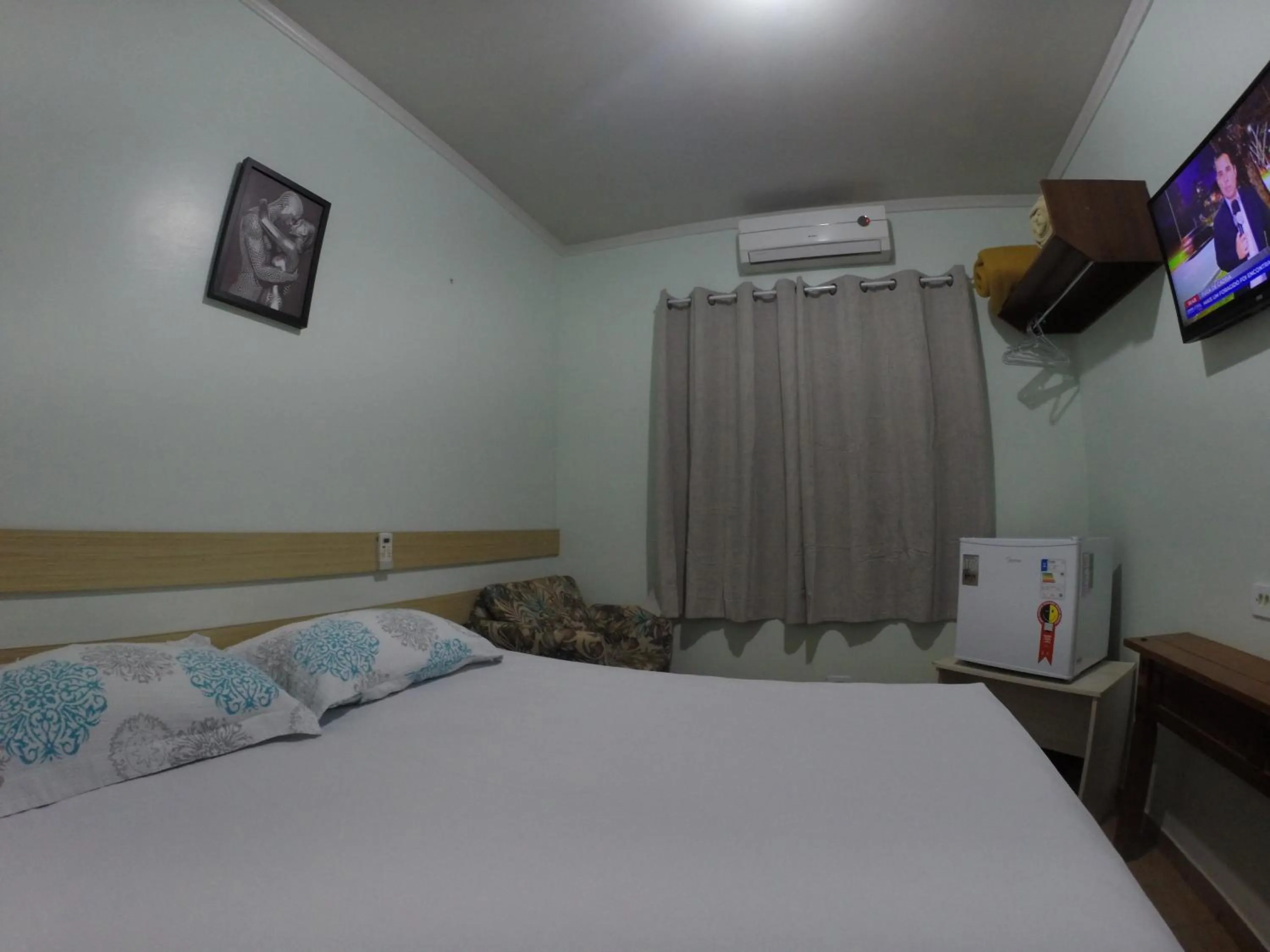 Bed in POUSADA EVELINA