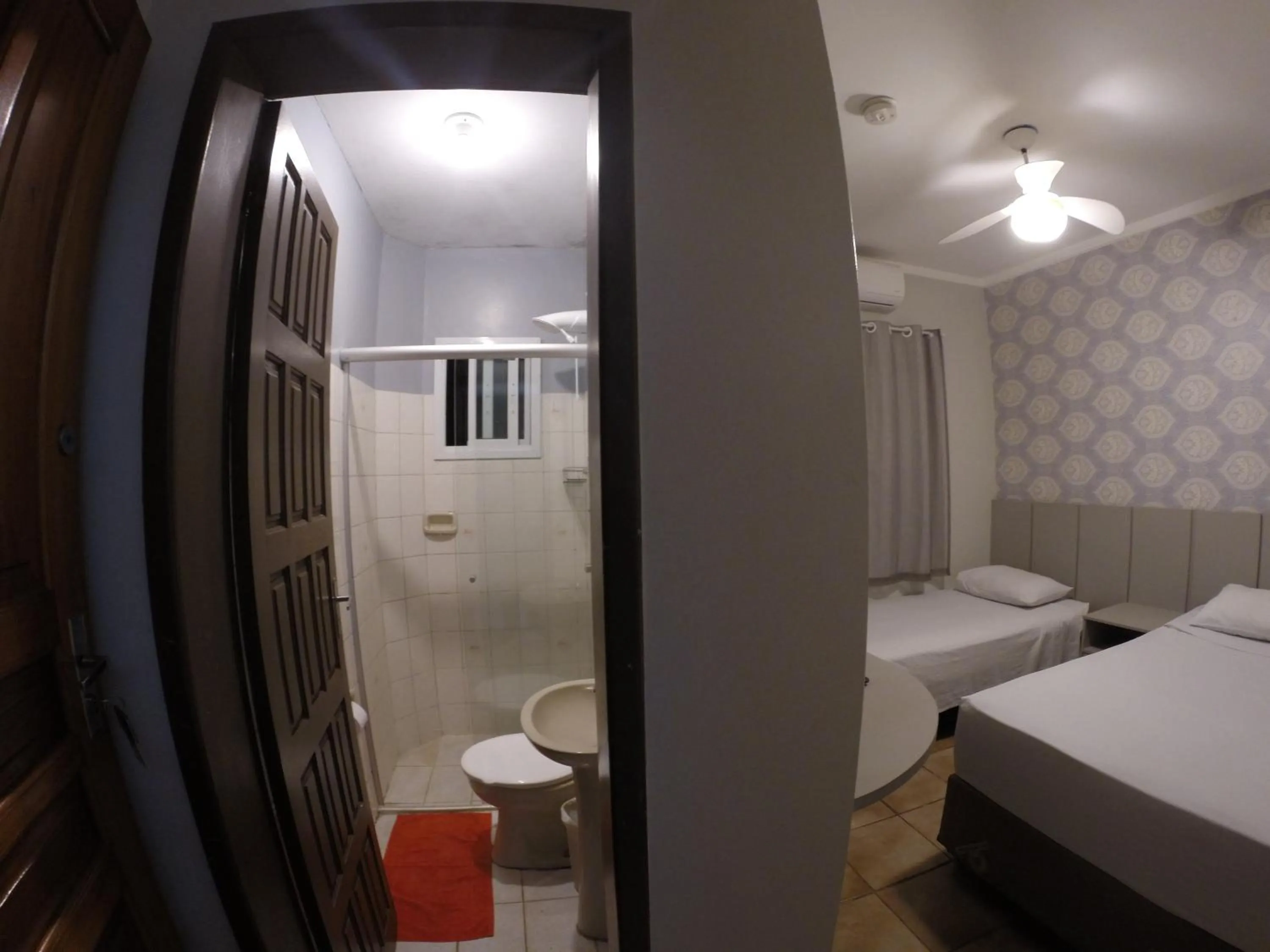 Bed in POUSADA EVELINA