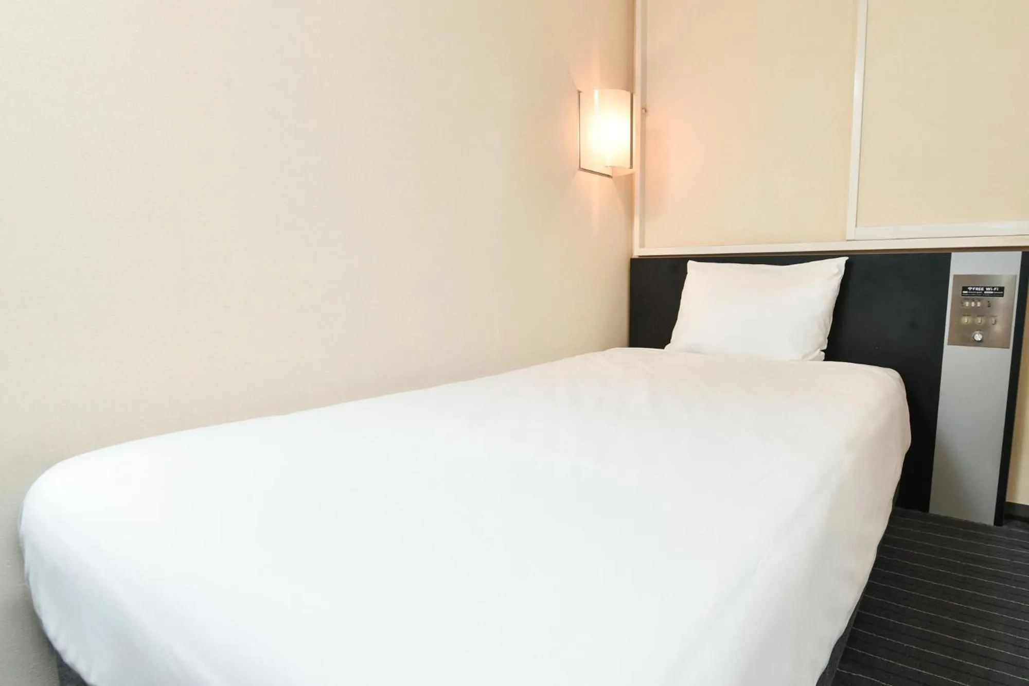 Photo of the whole room, Bed in Sanco Inn Nagoya Fushimi