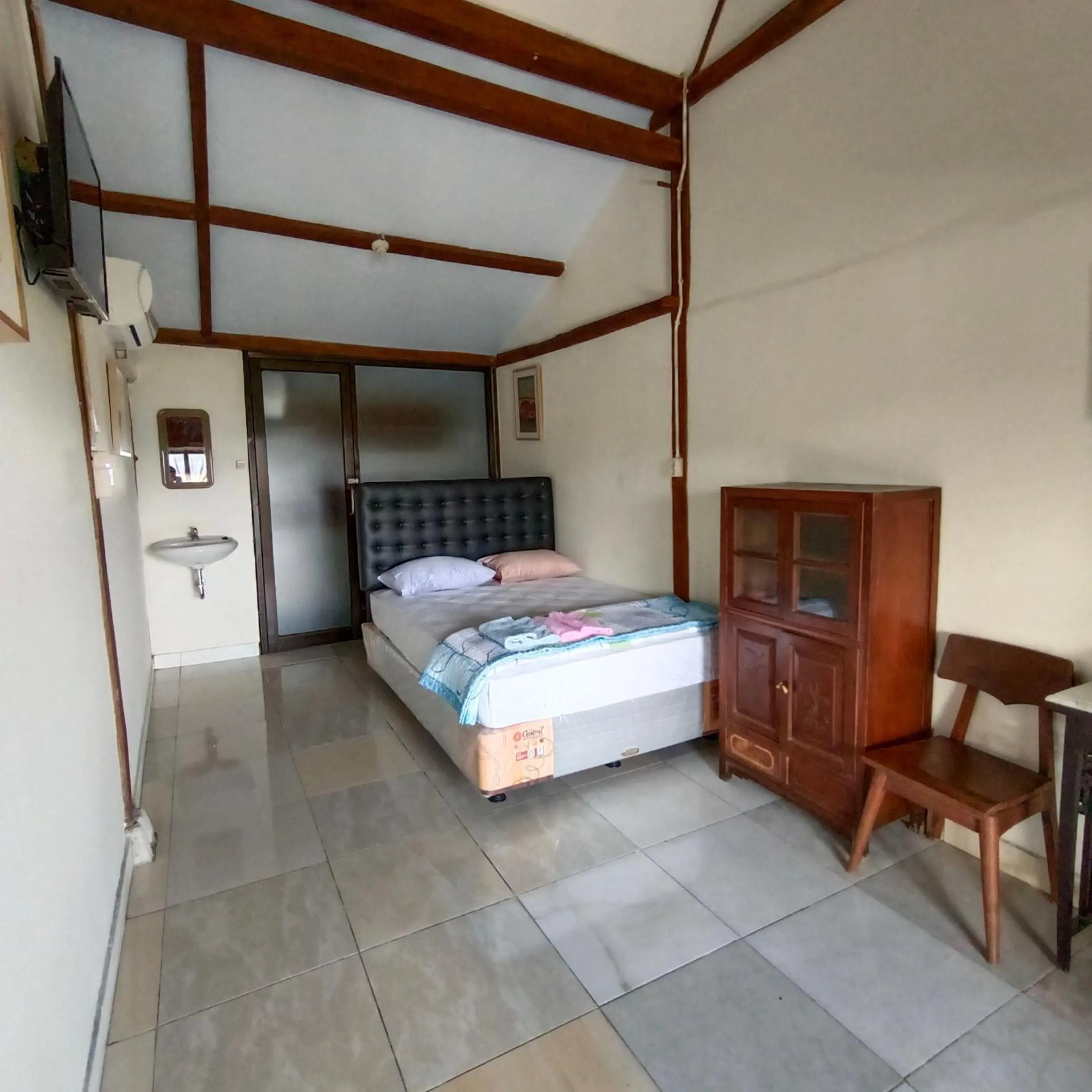 Bed in Omah Singo Stay & Resto Yogyakarta