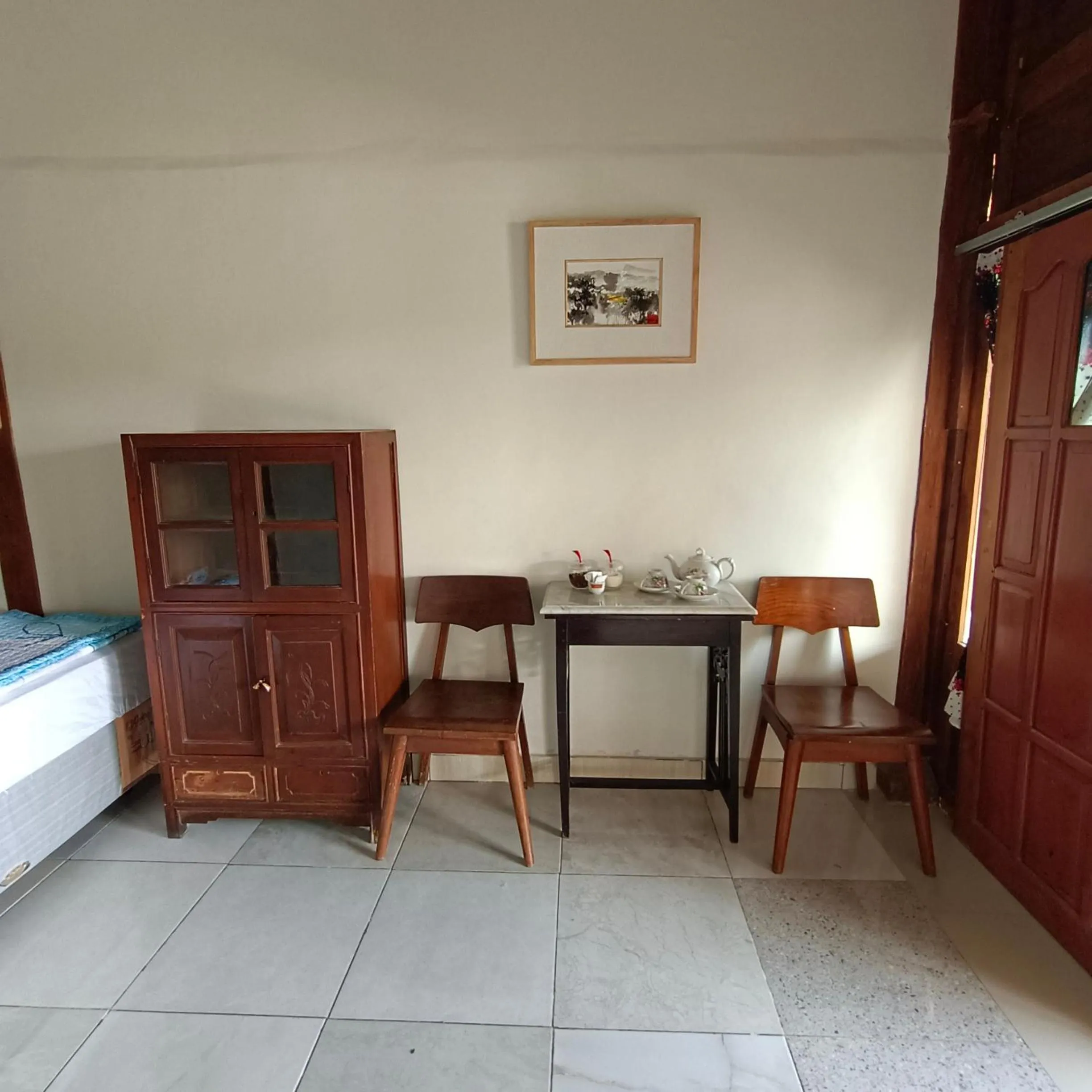 Living room, Bed in Omah Singo Stay & Resto Yogyakarta