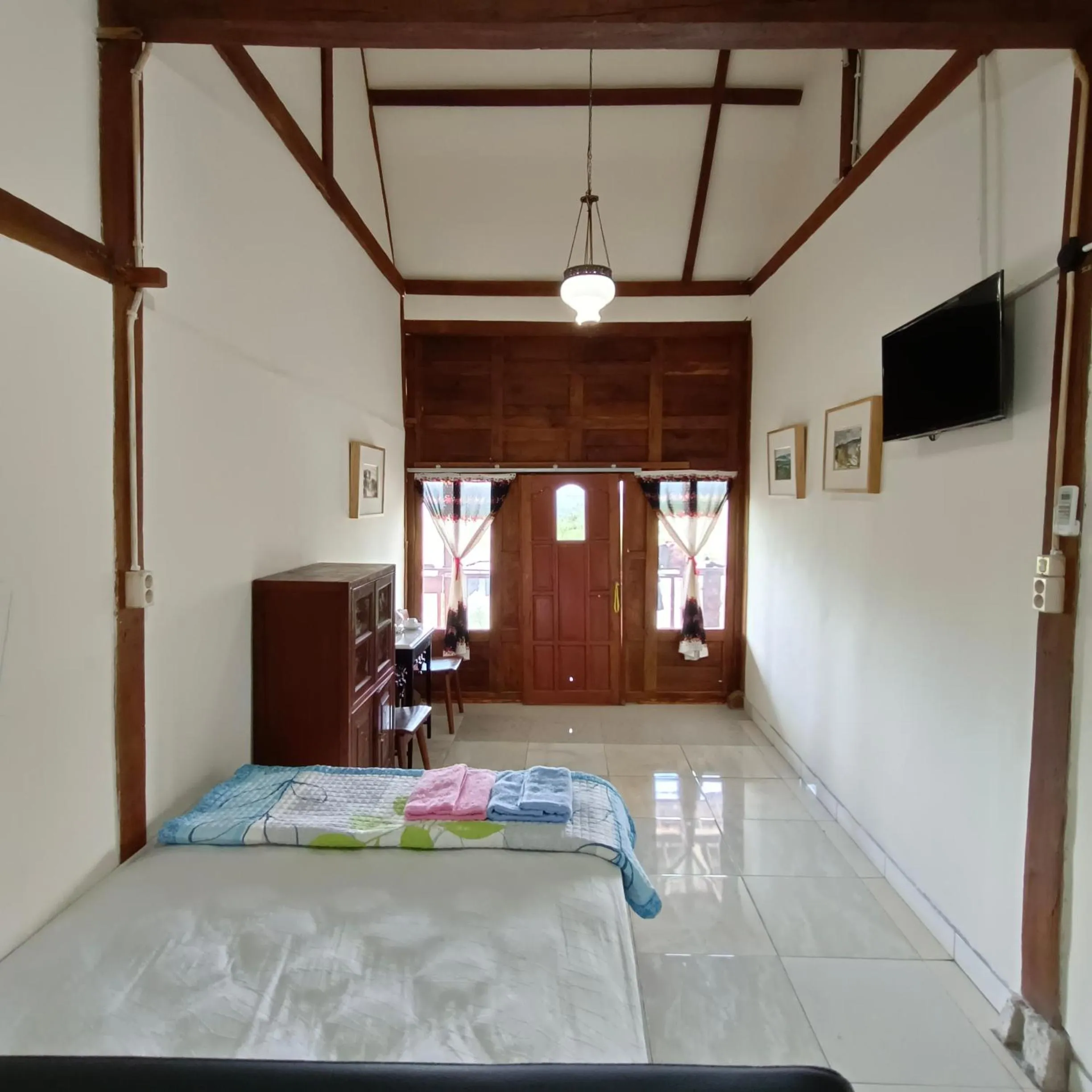 Bed in Omah Singo Stay & Resto Yogyakarta