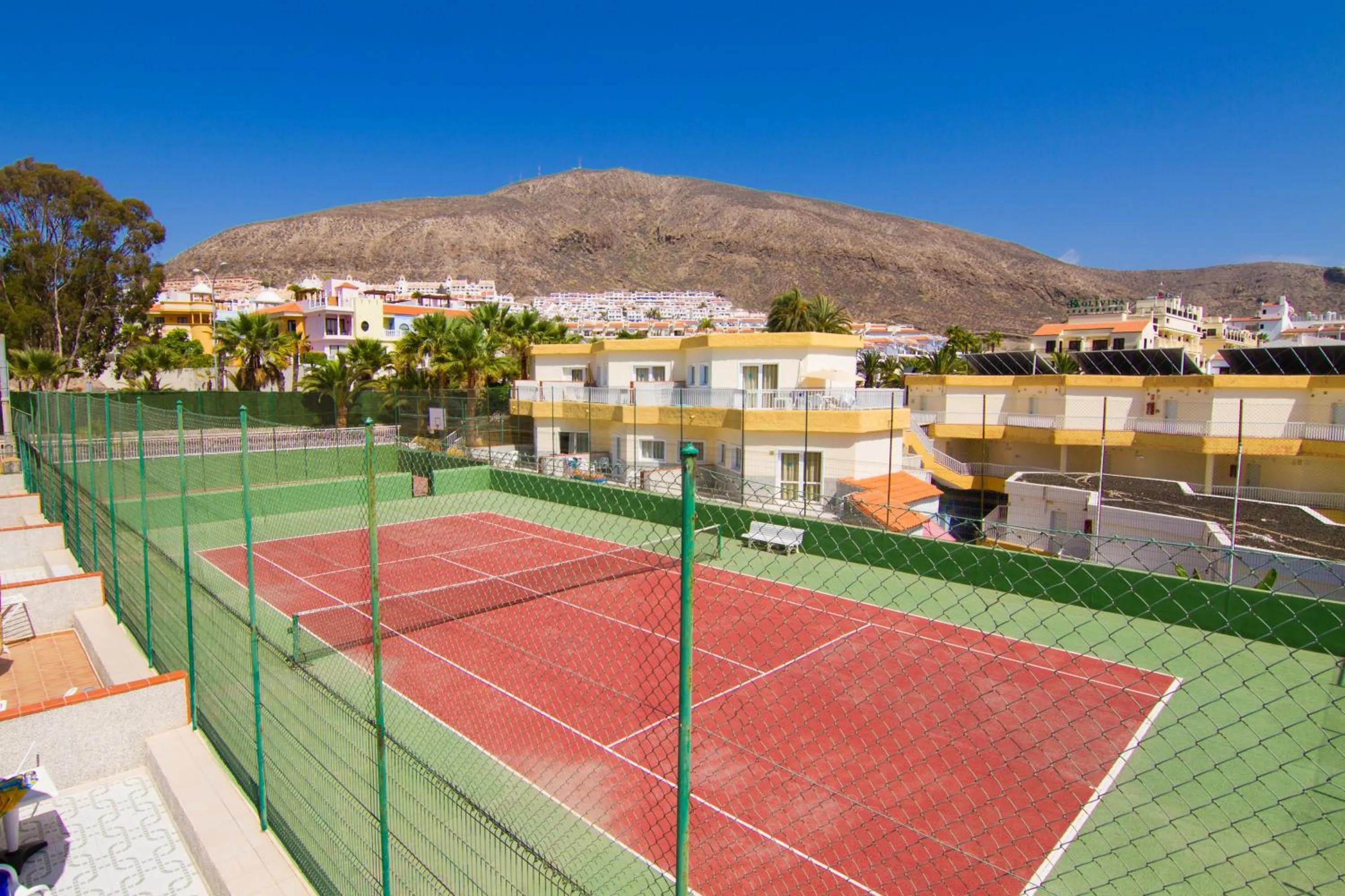 Tennis court in Checkin Bungalows Atlántida