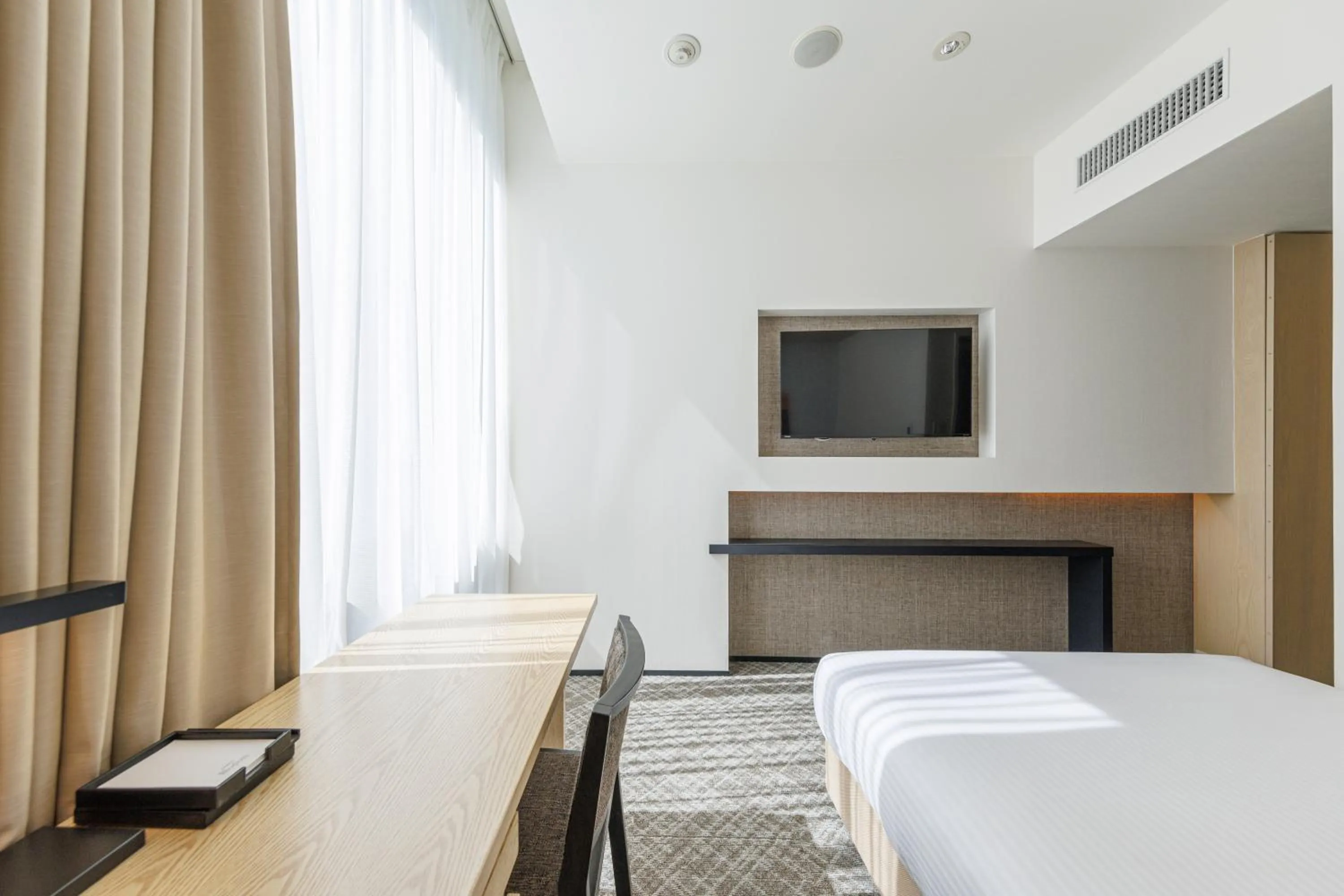 Decorative detail, Bed in JR Kyushu Hotel Blossom Shinjuku