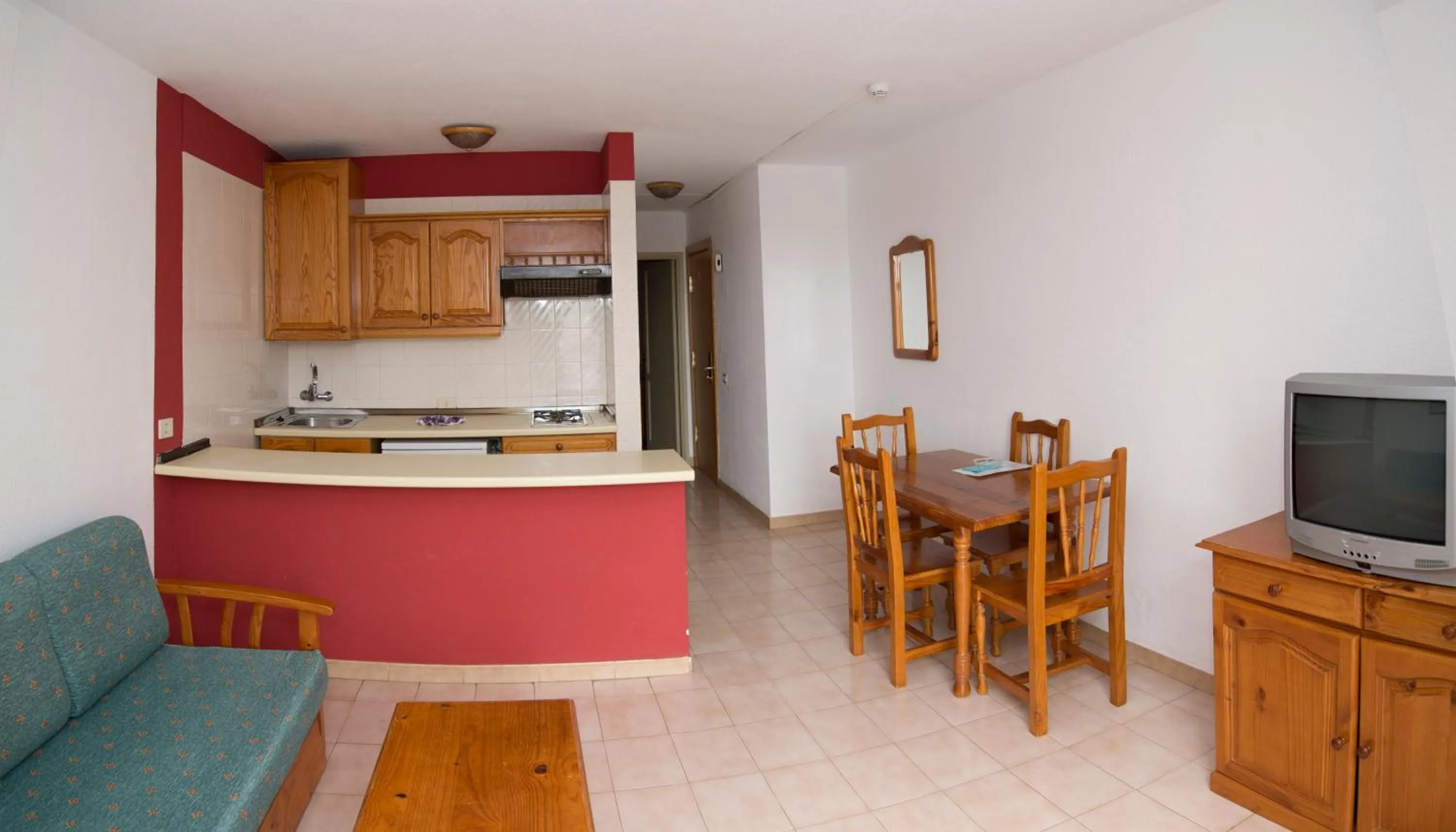 Kitchen or kitchenette in Apartamentos Checkin Laurisilva
