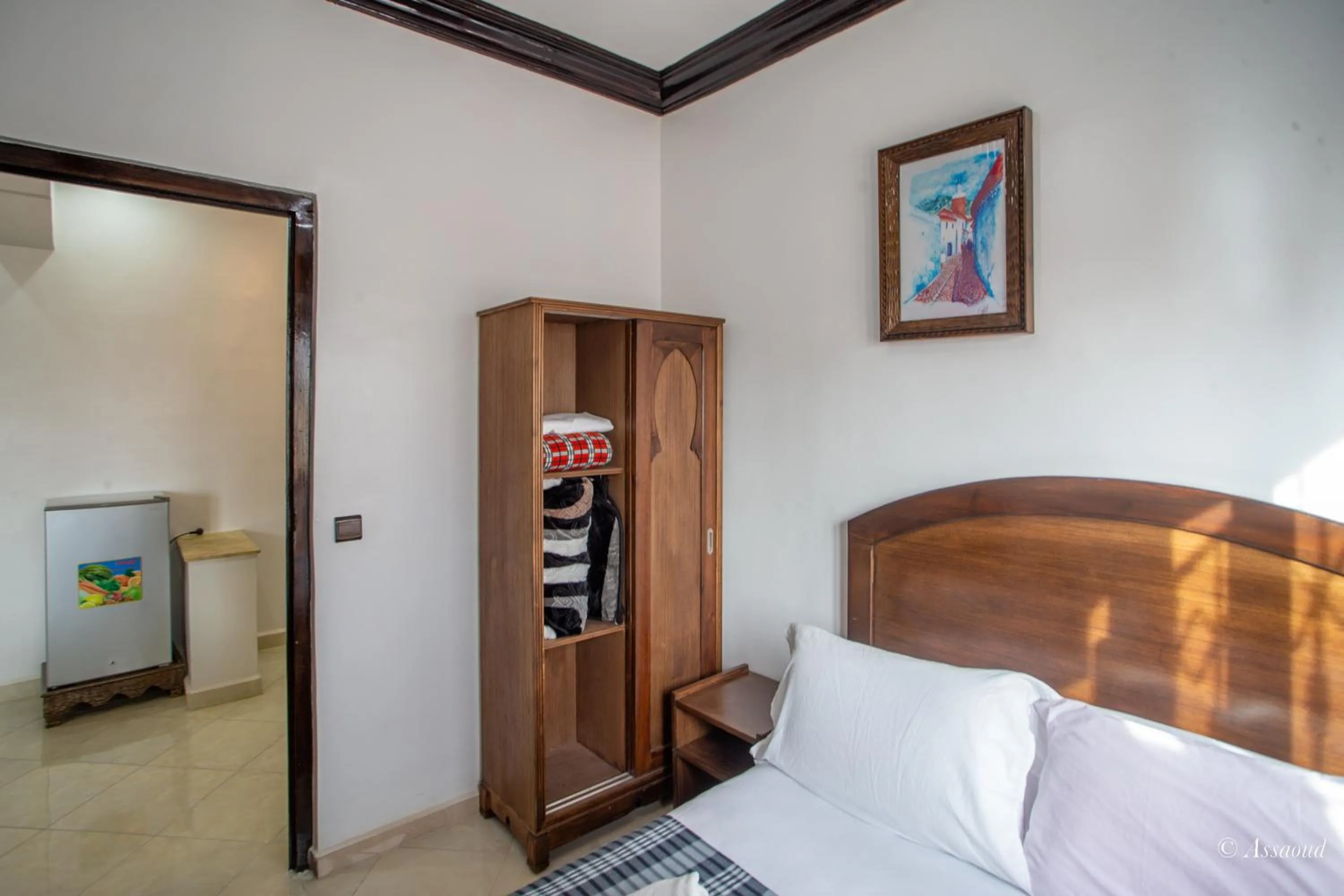 Bed in Maison d'hôtes Afassi