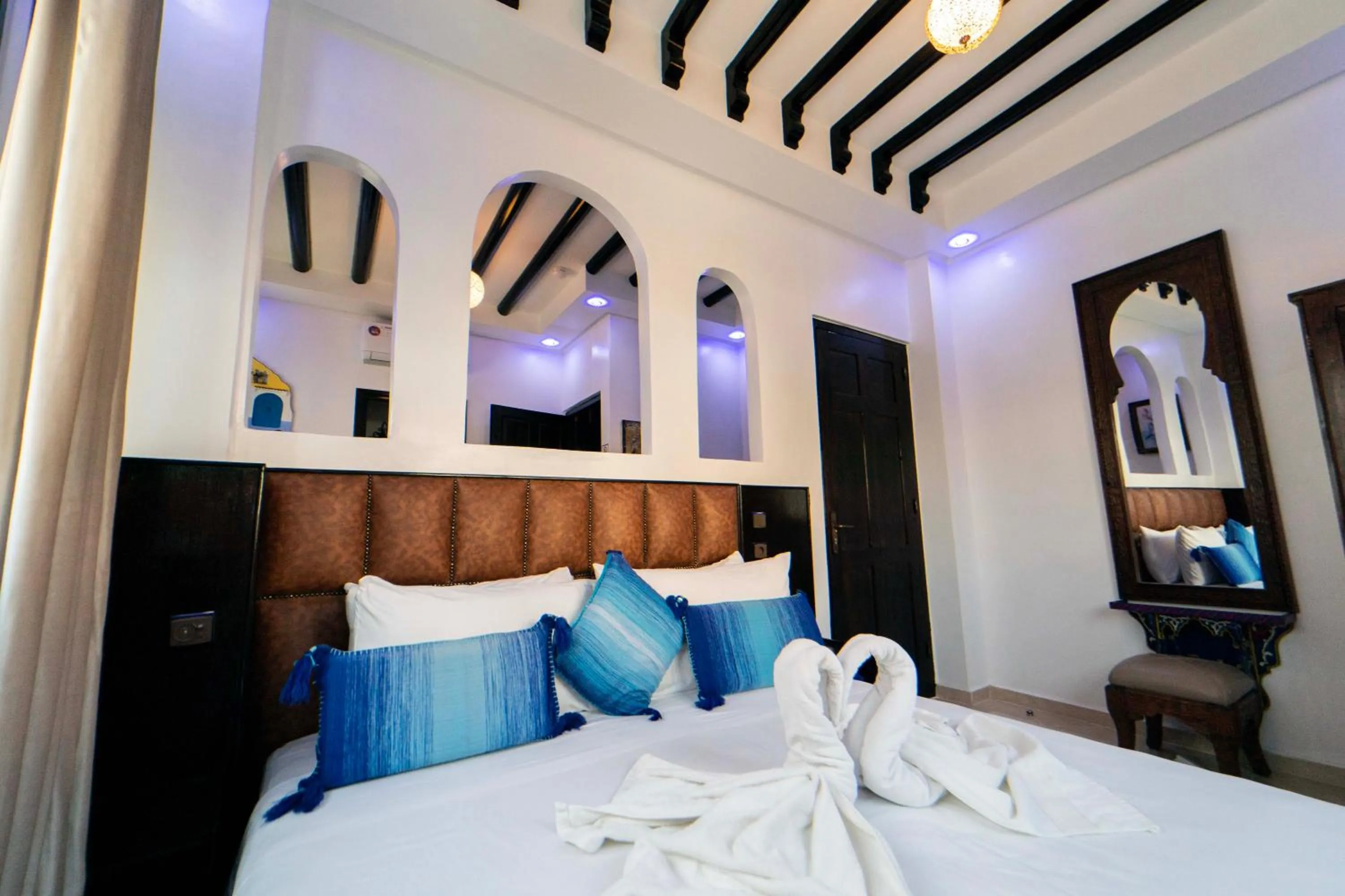 Bed in Maison d'hôtes Afassi