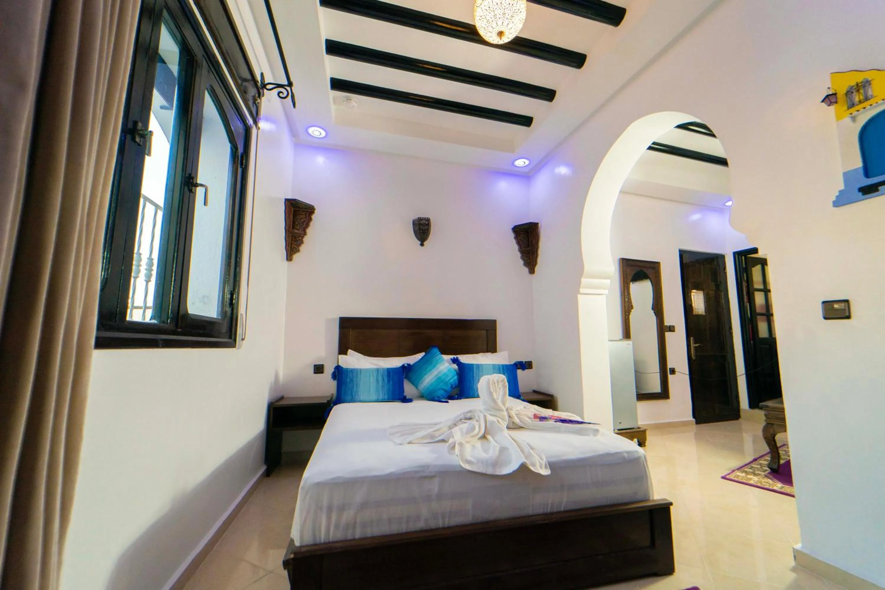 Bed in Maison d'hôtes Afassi