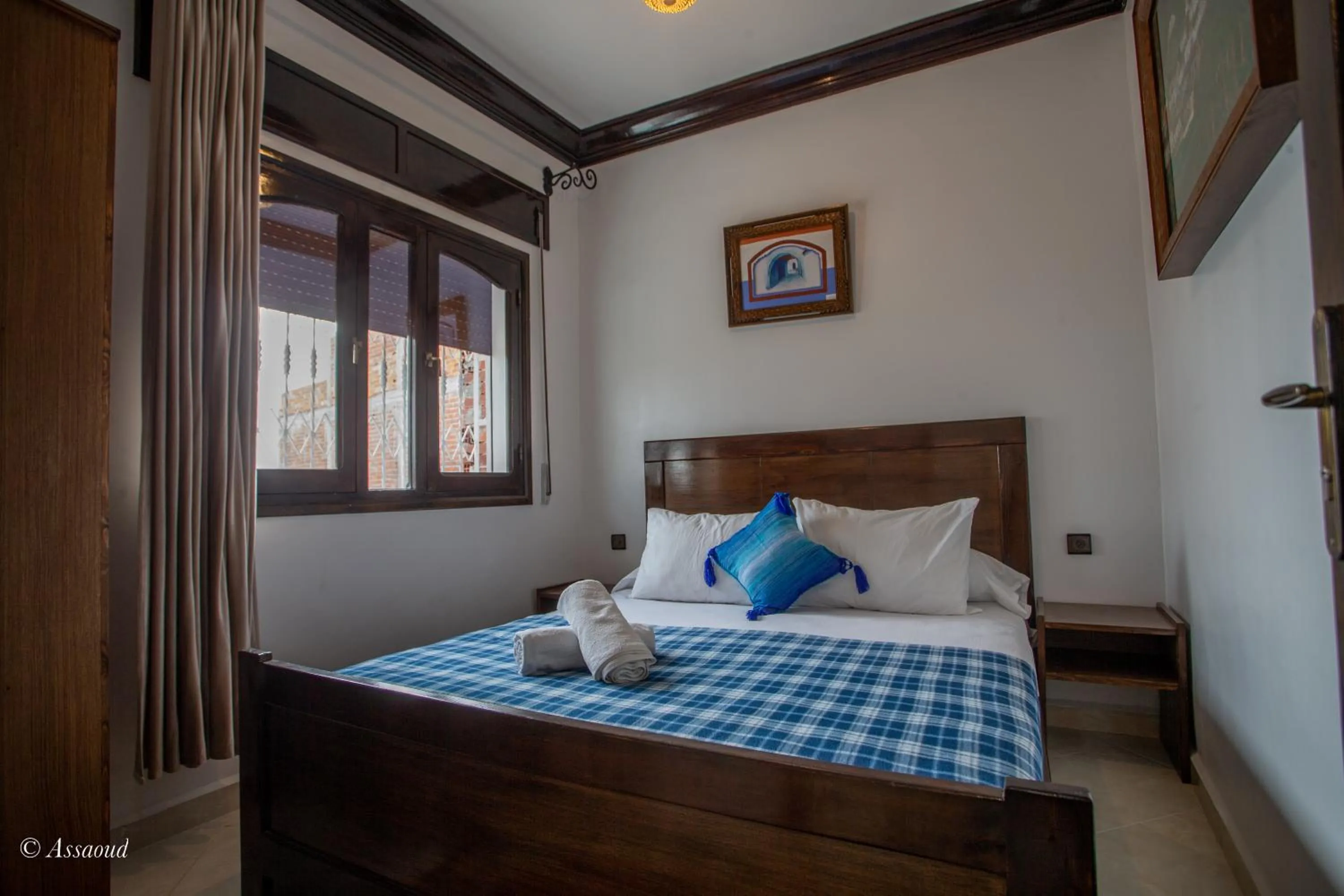 Bed in Maison d'hôtes Afassi