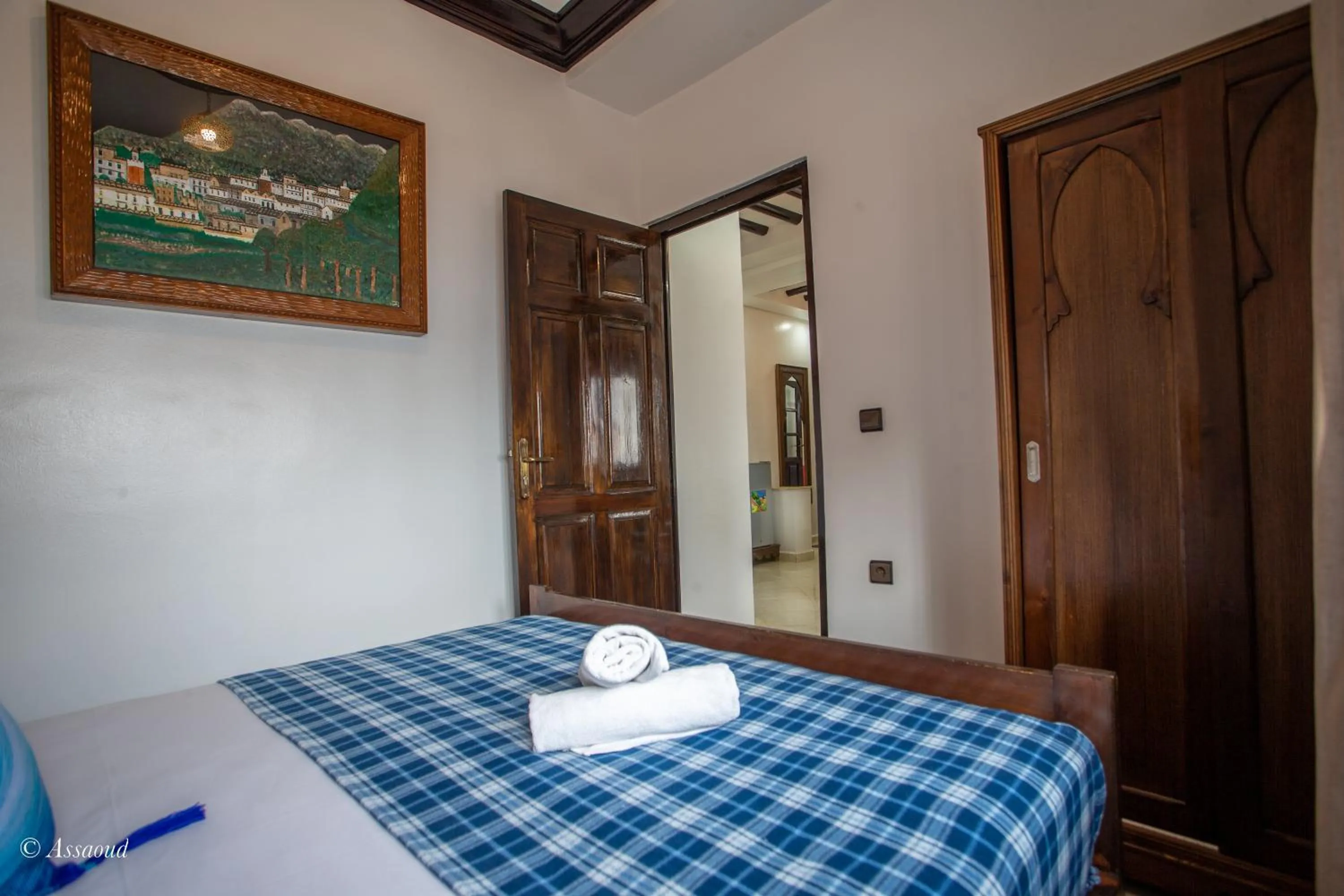 Bed in Maison d'hôtes Afassi