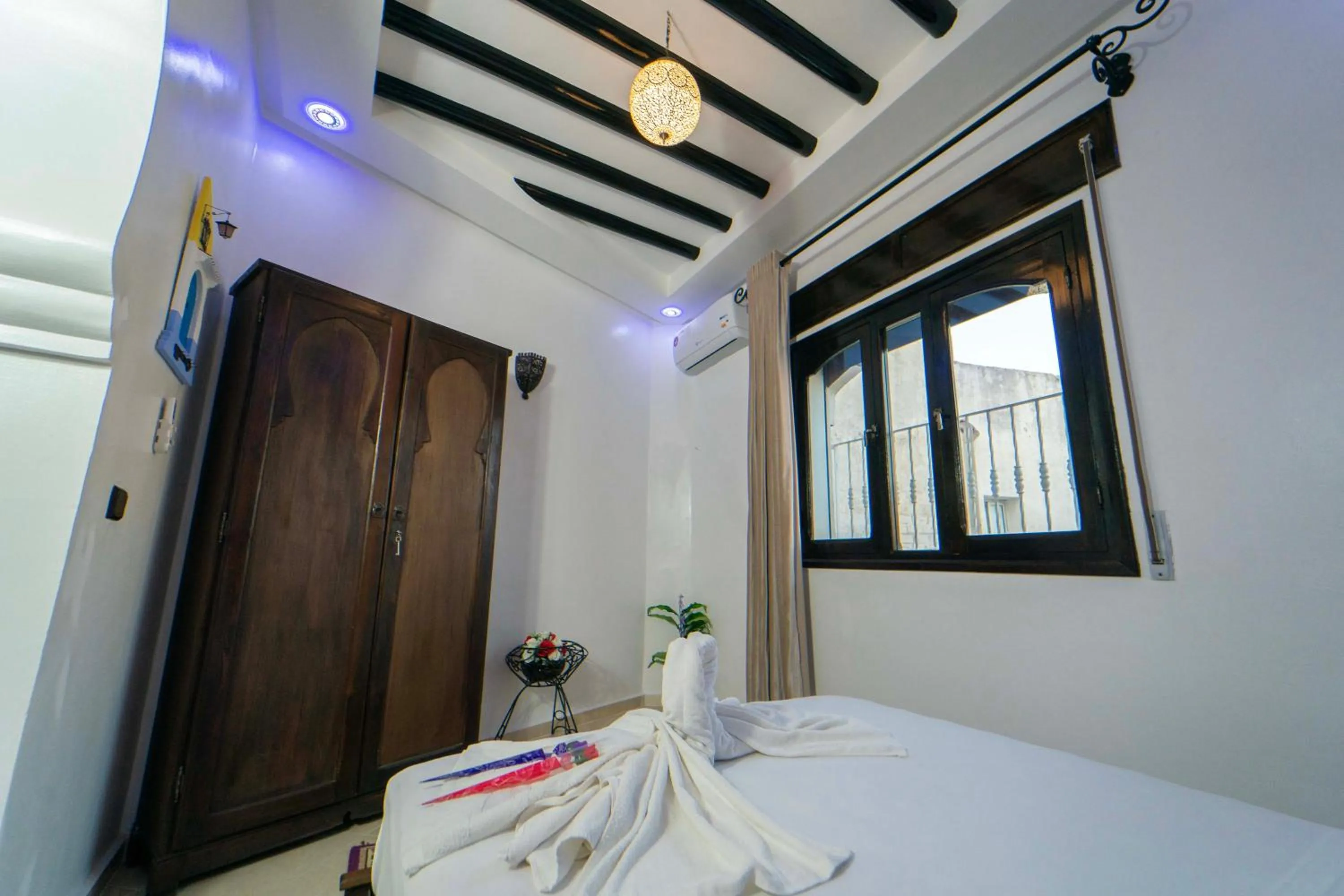 Bed in Maison d'hôtes Afassi