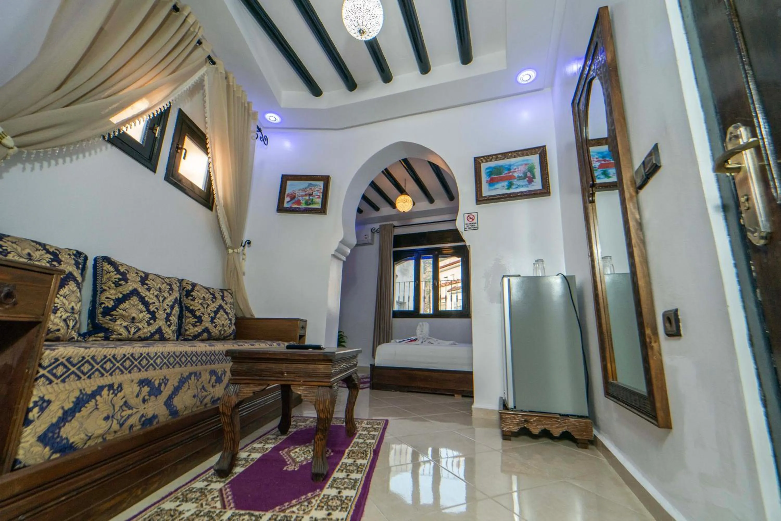 TV and multimedia in Maison d'hôtes Afassi