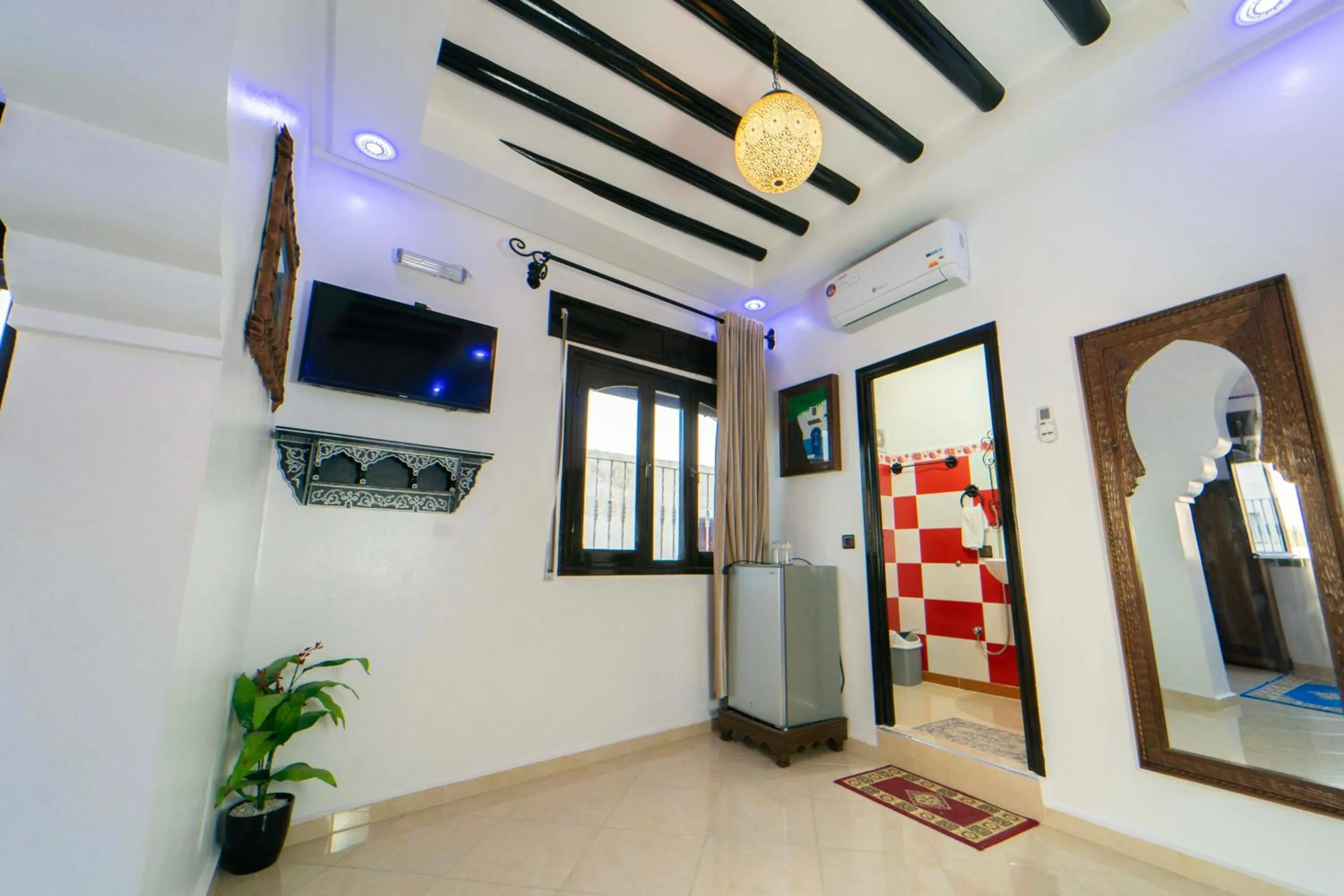 TV and multimedia in Maison d'hôtes Afassi