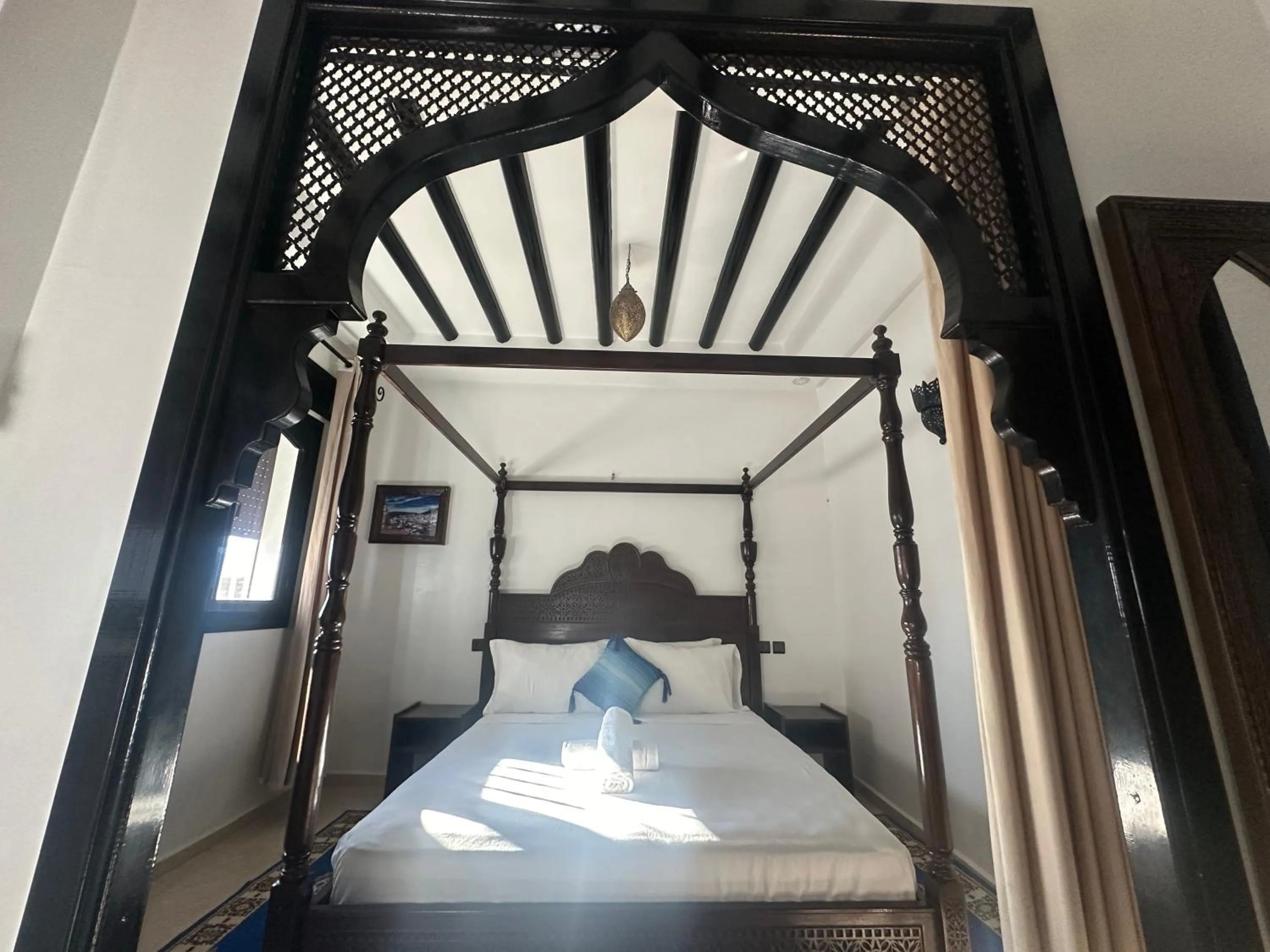 Bed in Maison d'hôtes Afassi