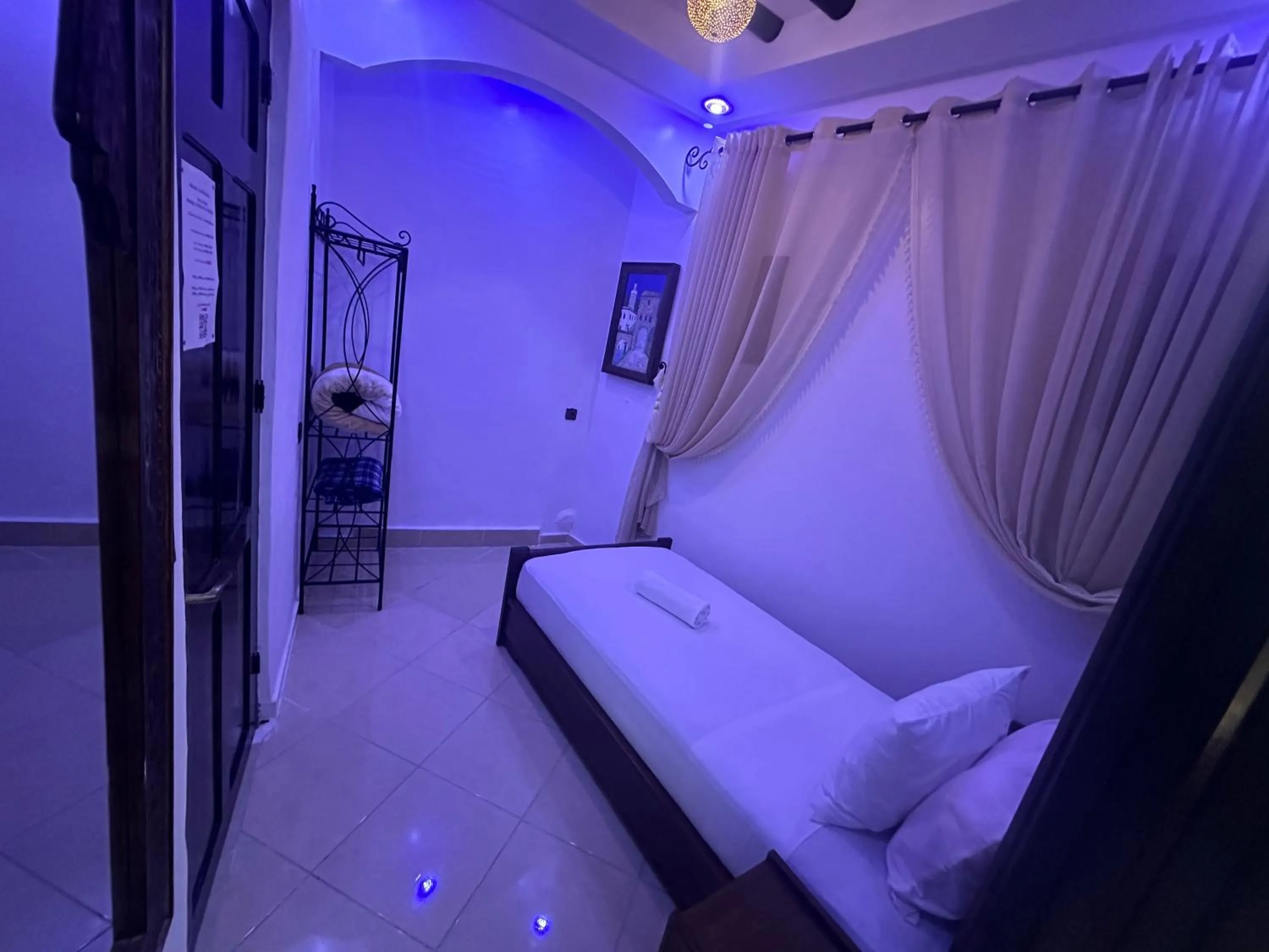 Bed in Maison d'hôtes Afassi