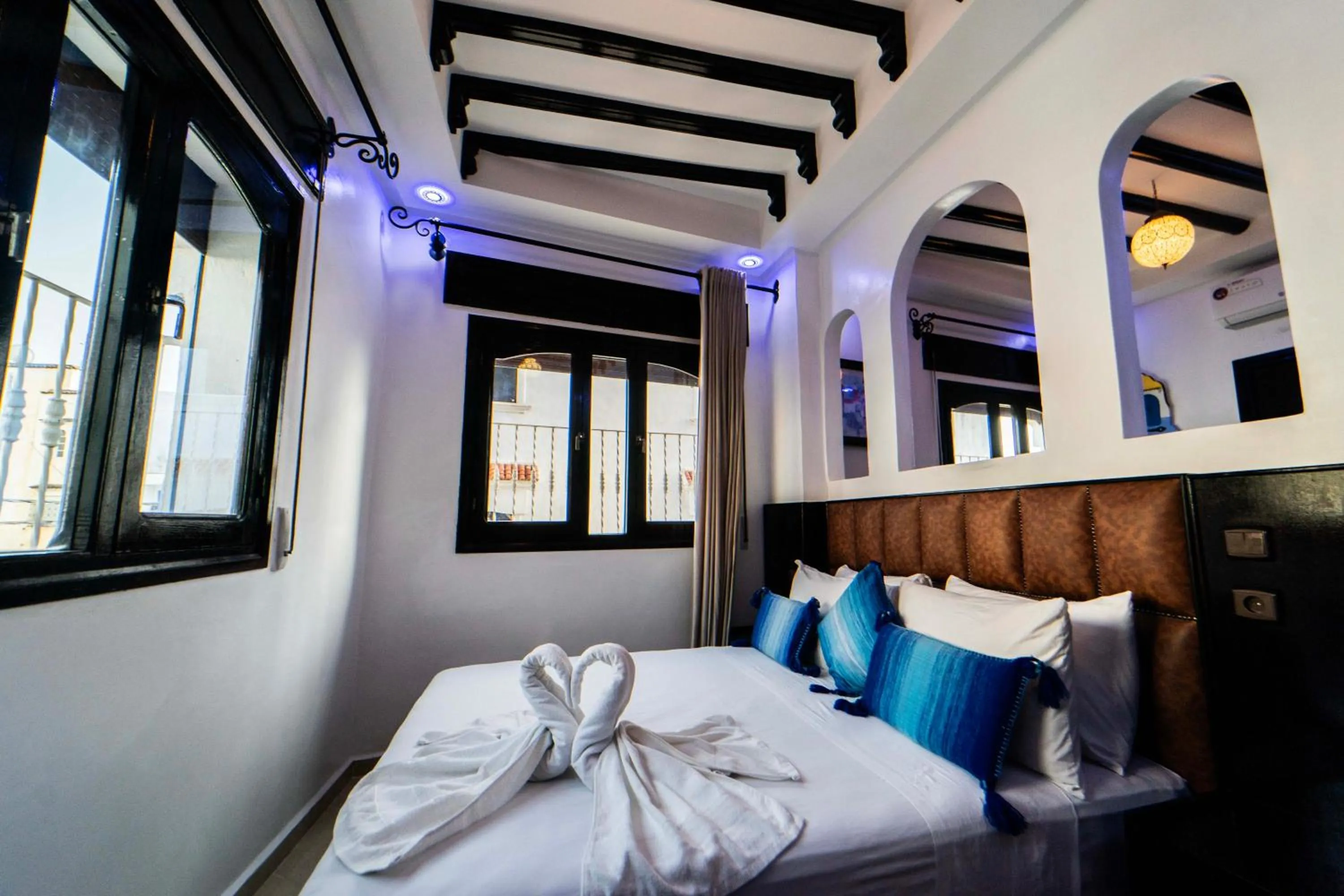 Bed in Maison d'hôtes Afassi