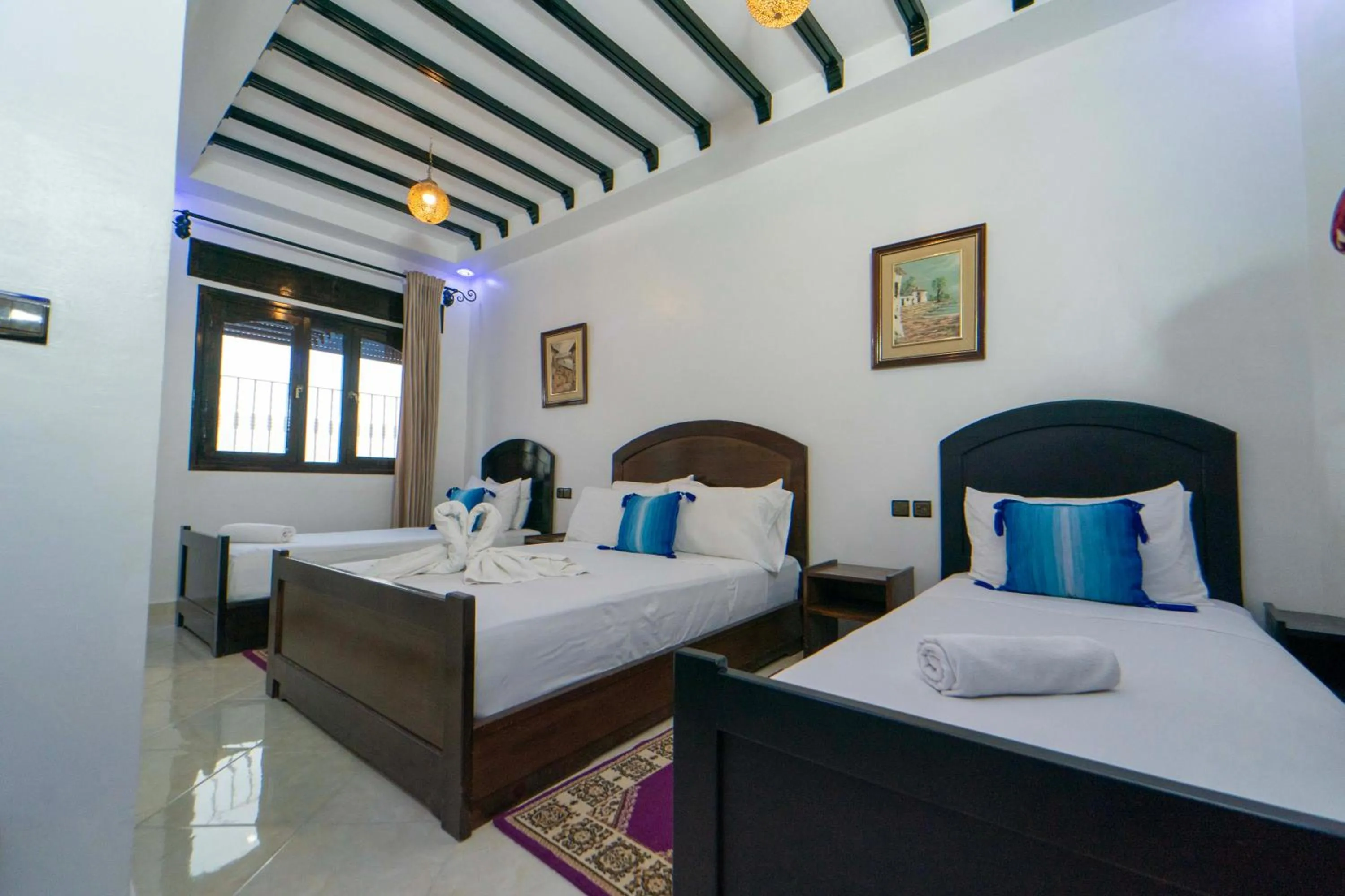 Bed in Maison d'hôtes Afassi