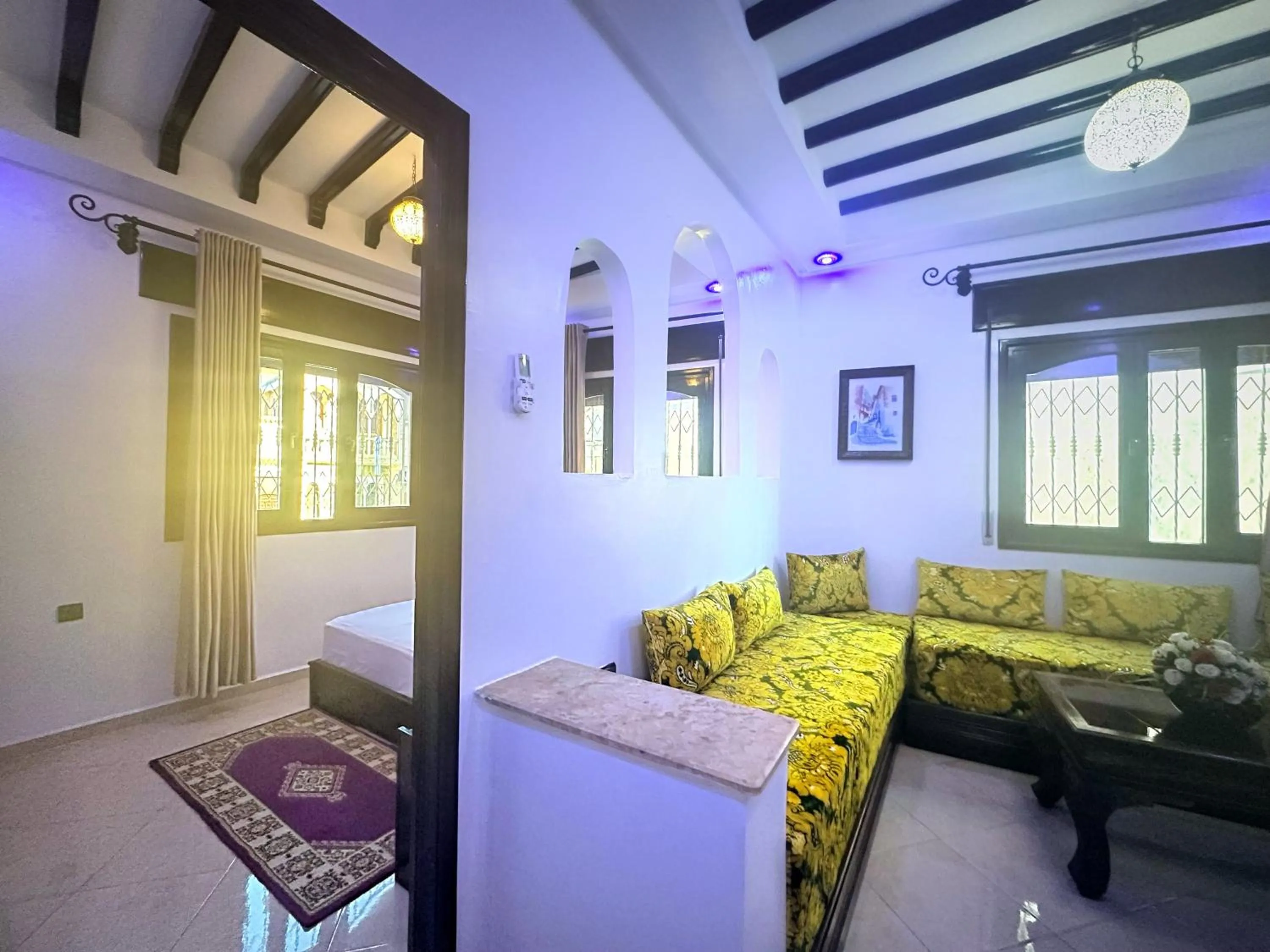 Living room, Bed in Maison d'hôtes Afassi