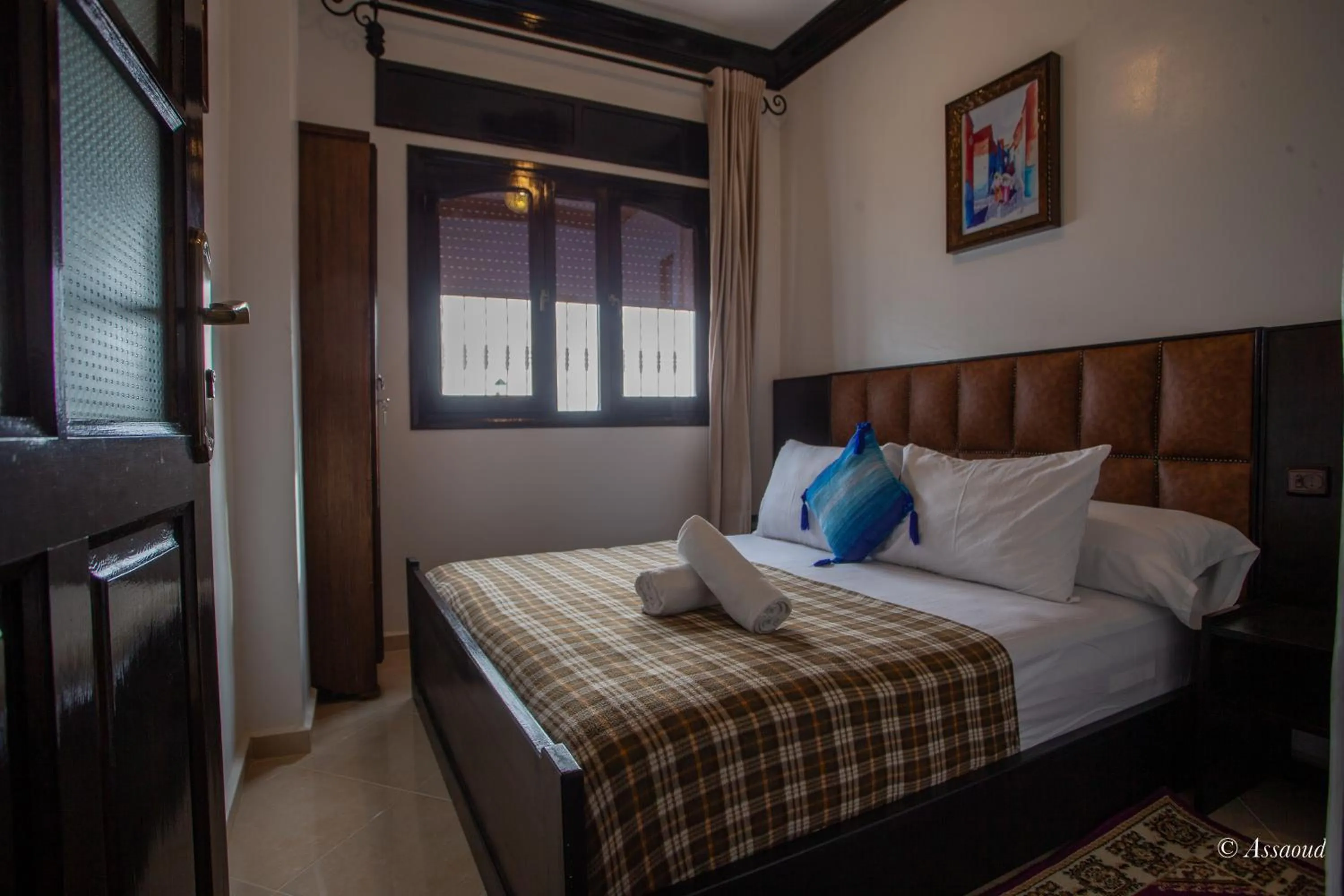 Bed in Maison d'hôtes Afassi