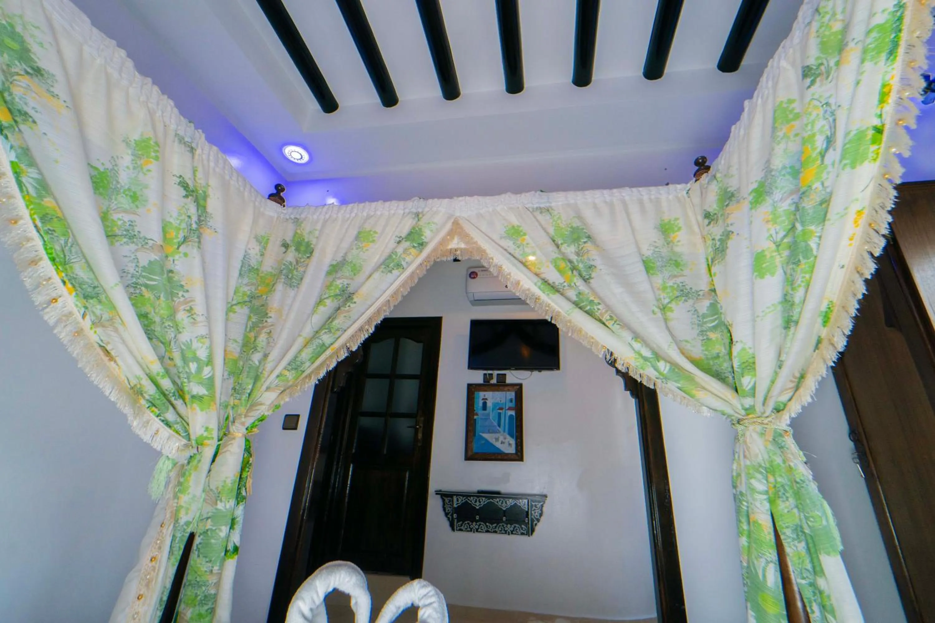 TV and multimedia in Maison d'hôtes Afassi