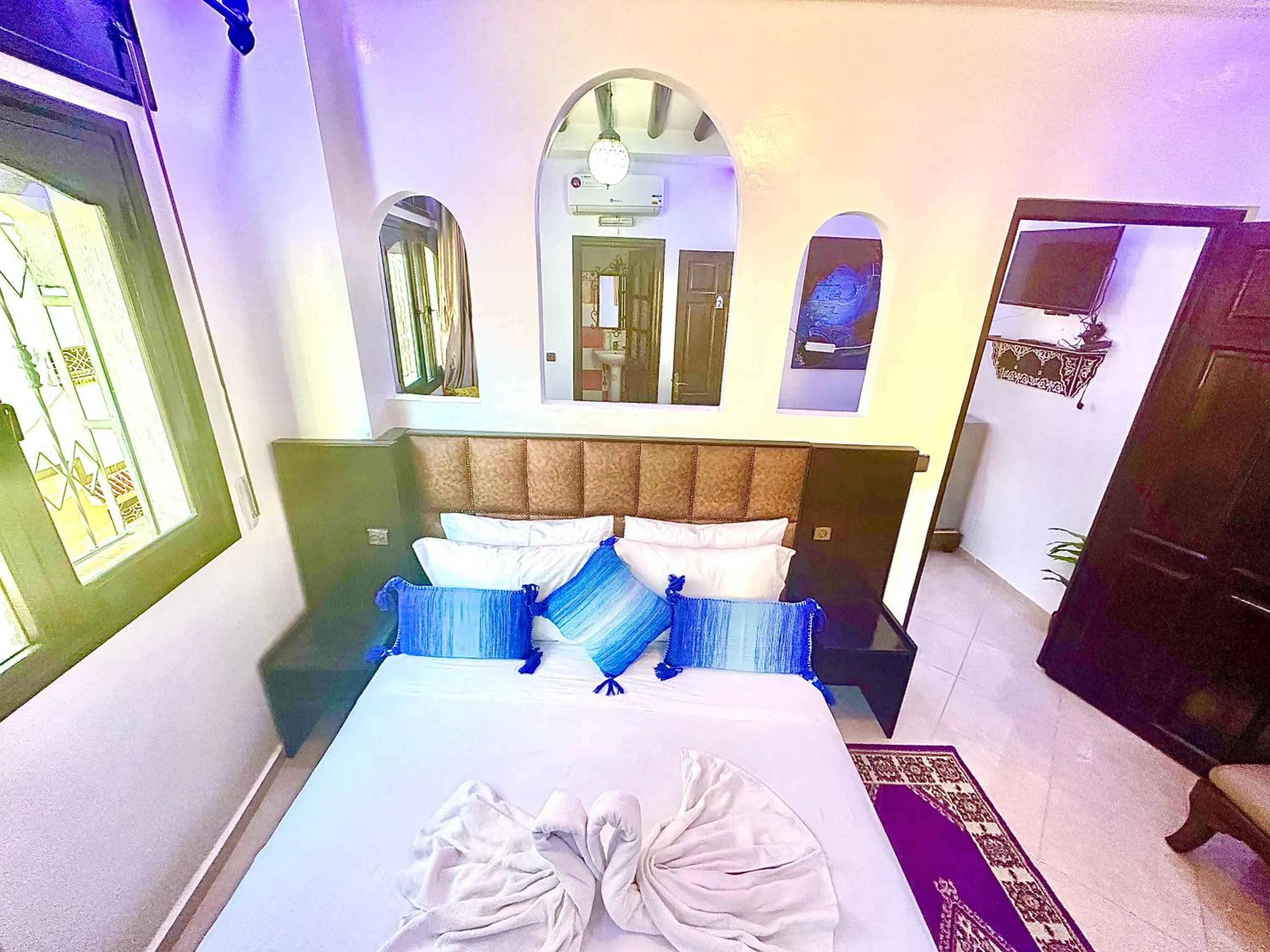 Bed in Maison d'hôtes Afassi