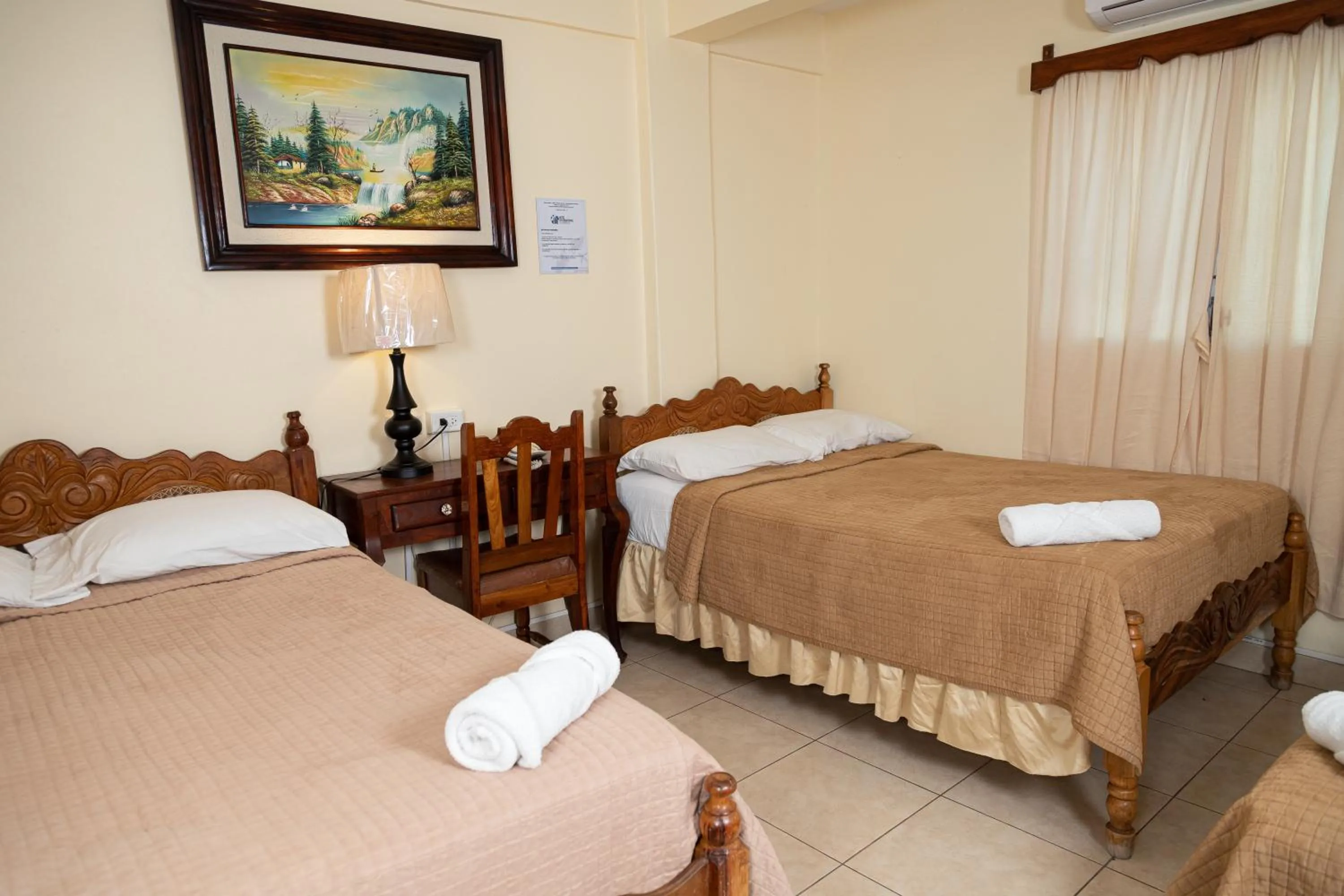 Bed in Hotel Internacional Palmerola