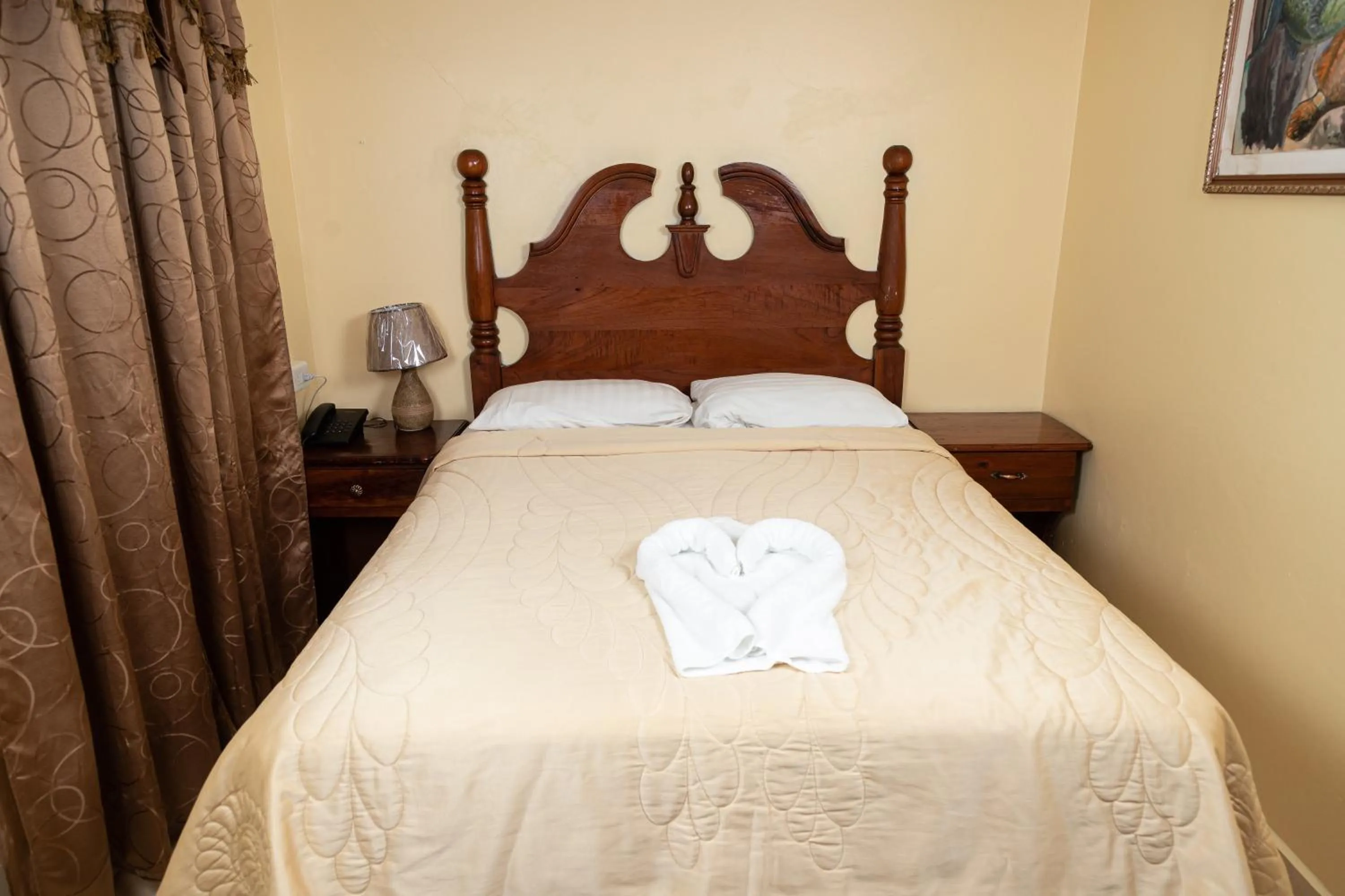 Bed in Hotel Internacional Palmerola