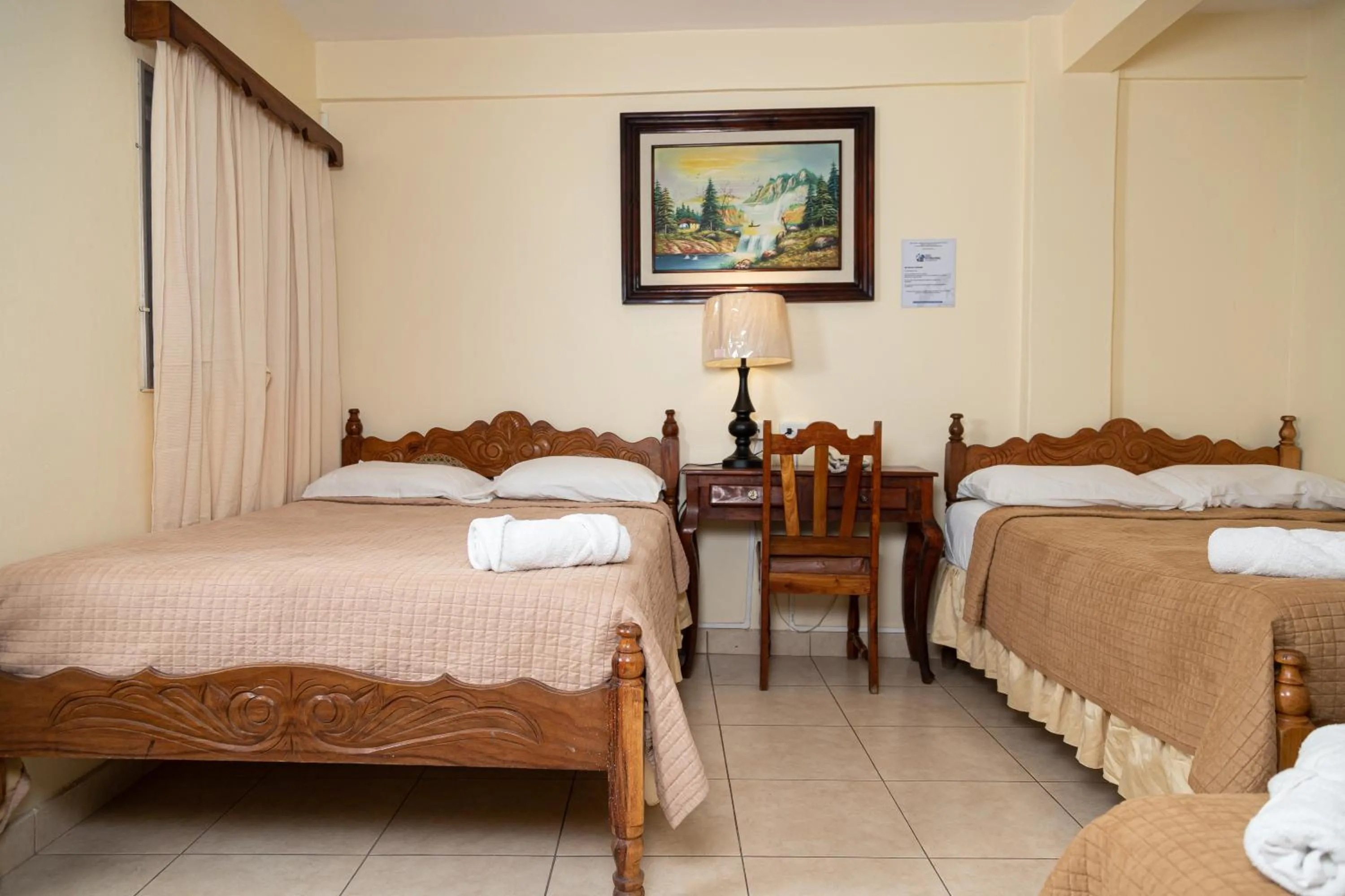 Bed in Hotel Internacional Palmerola