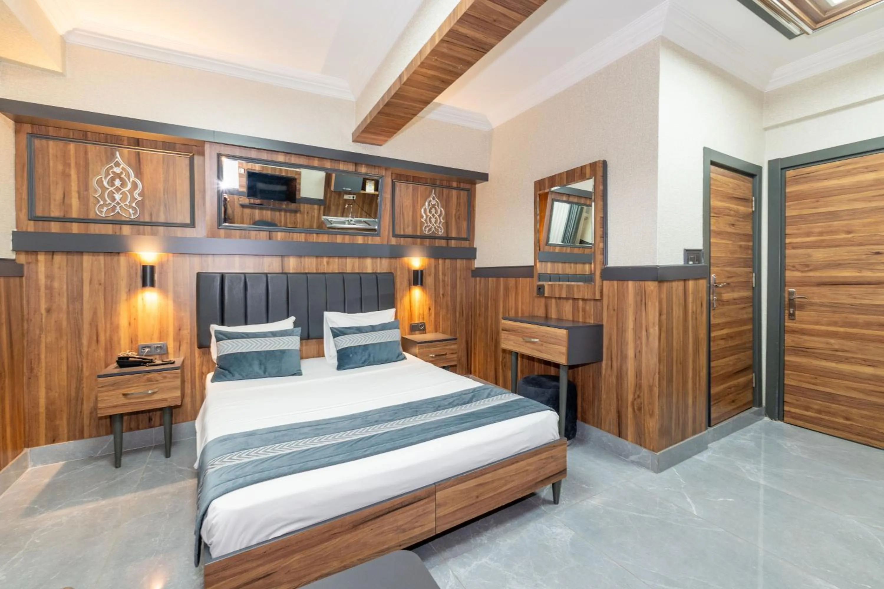 Bed in La Serena Taxim Hotel