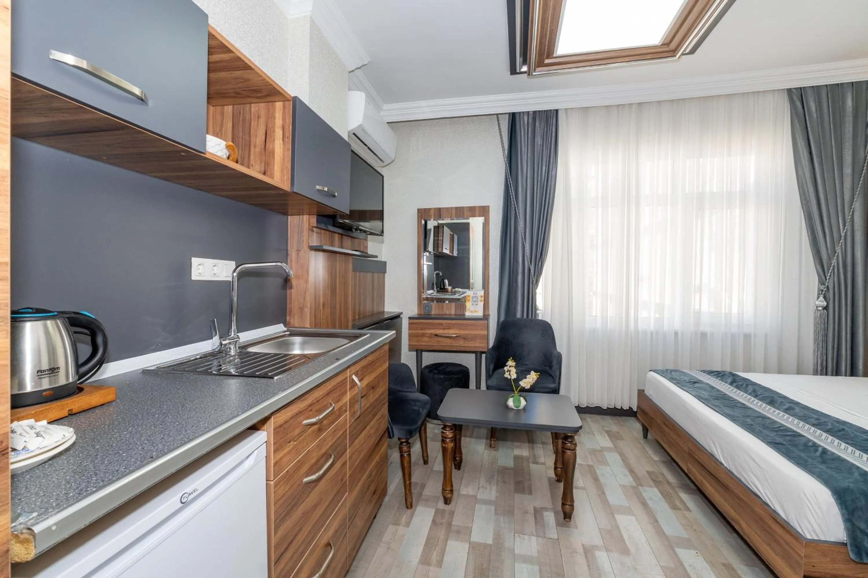 Bed in La Serena Taxim Hotel