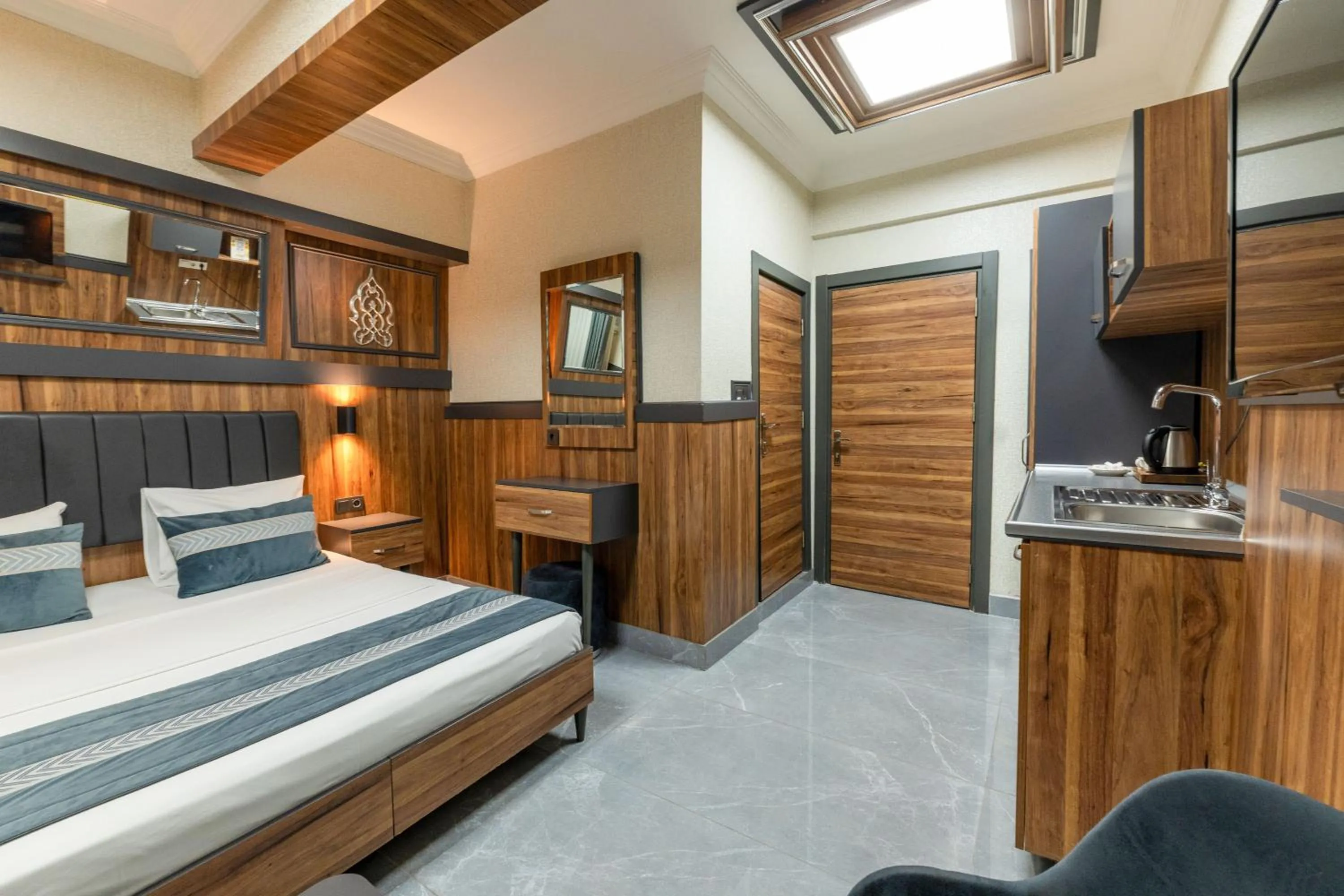 Bed in La Serena Taxim Hotel