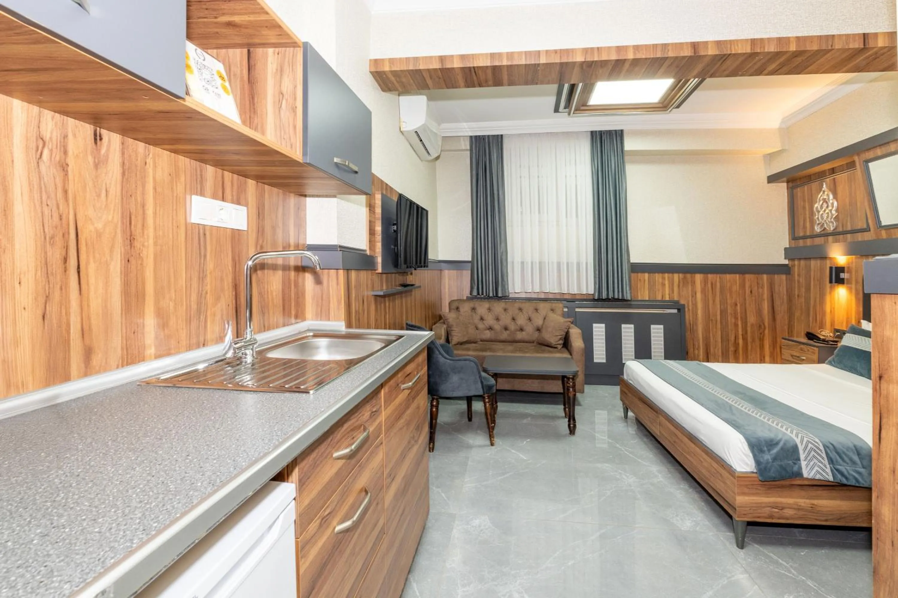 Bed in La Serena Taxim Hotel