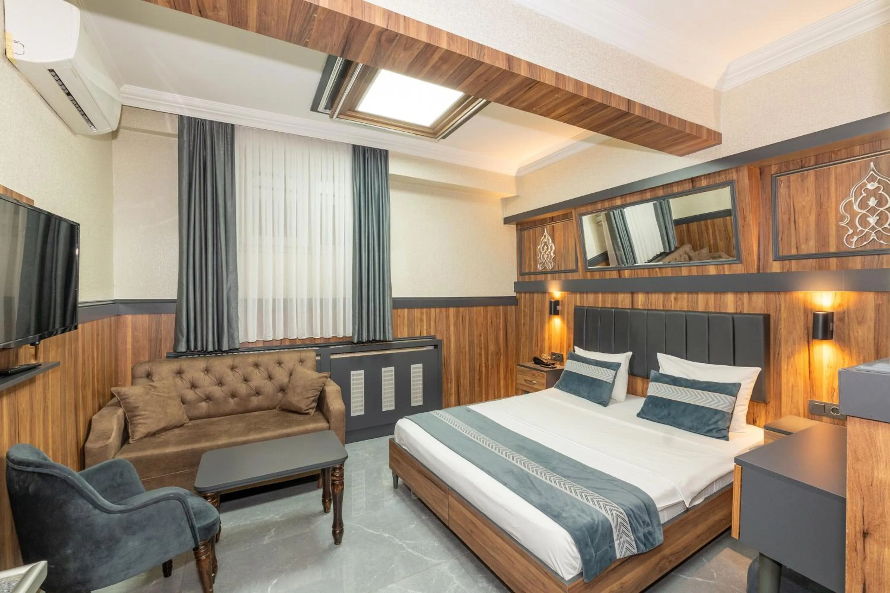 Bed in La Serena Taxim Hotel